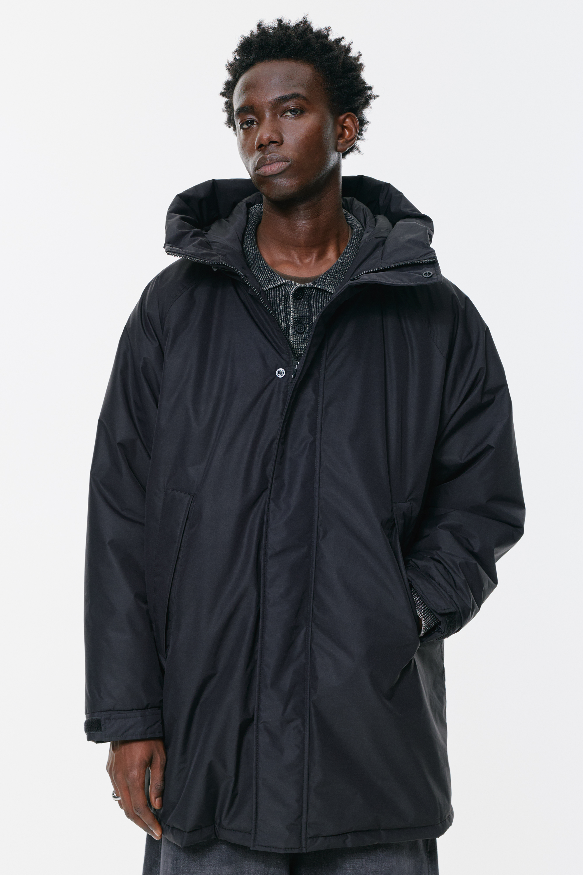 Langer wattierter Regenmantel