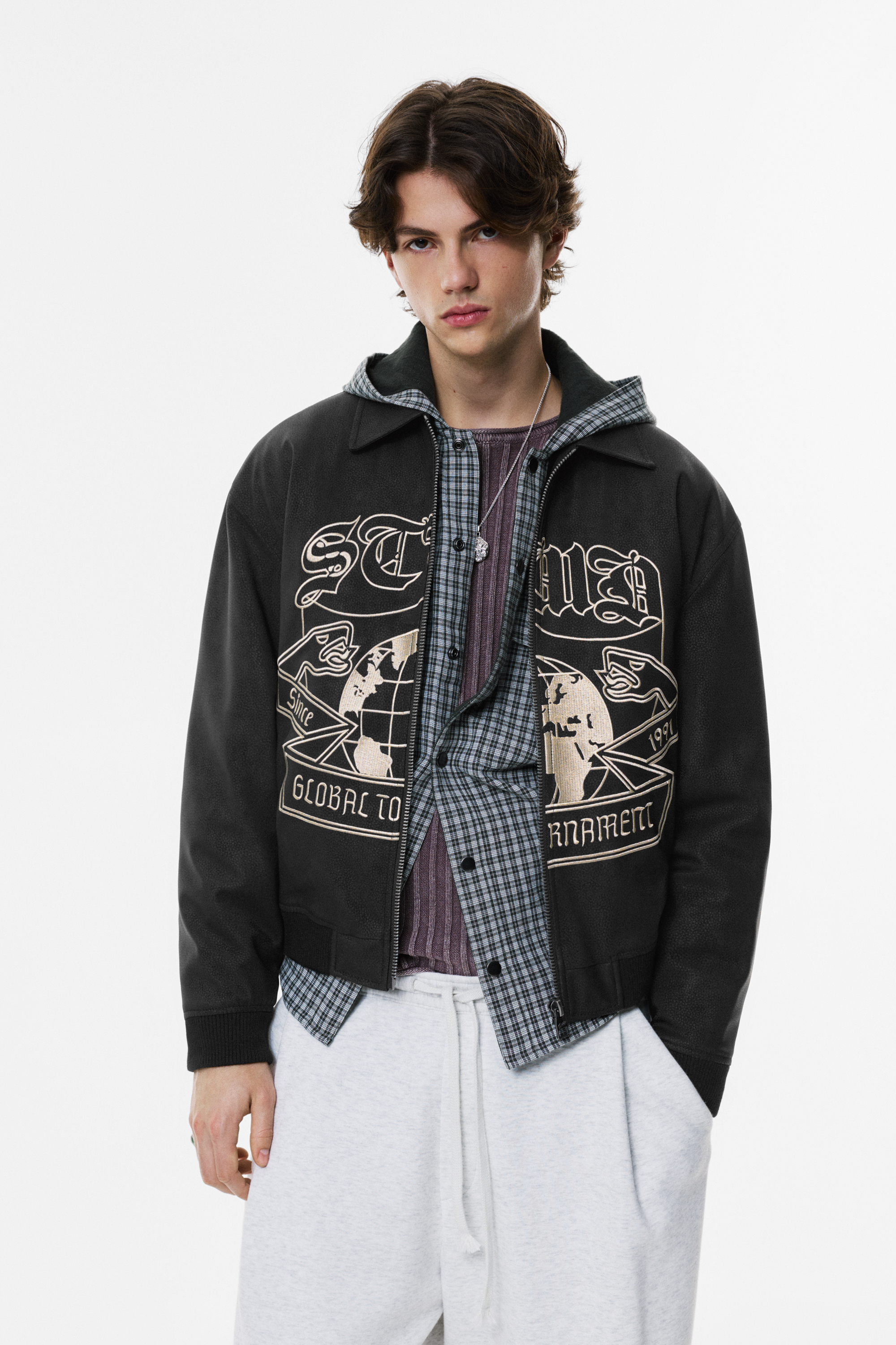 Embroidered leather effect bomber jacket