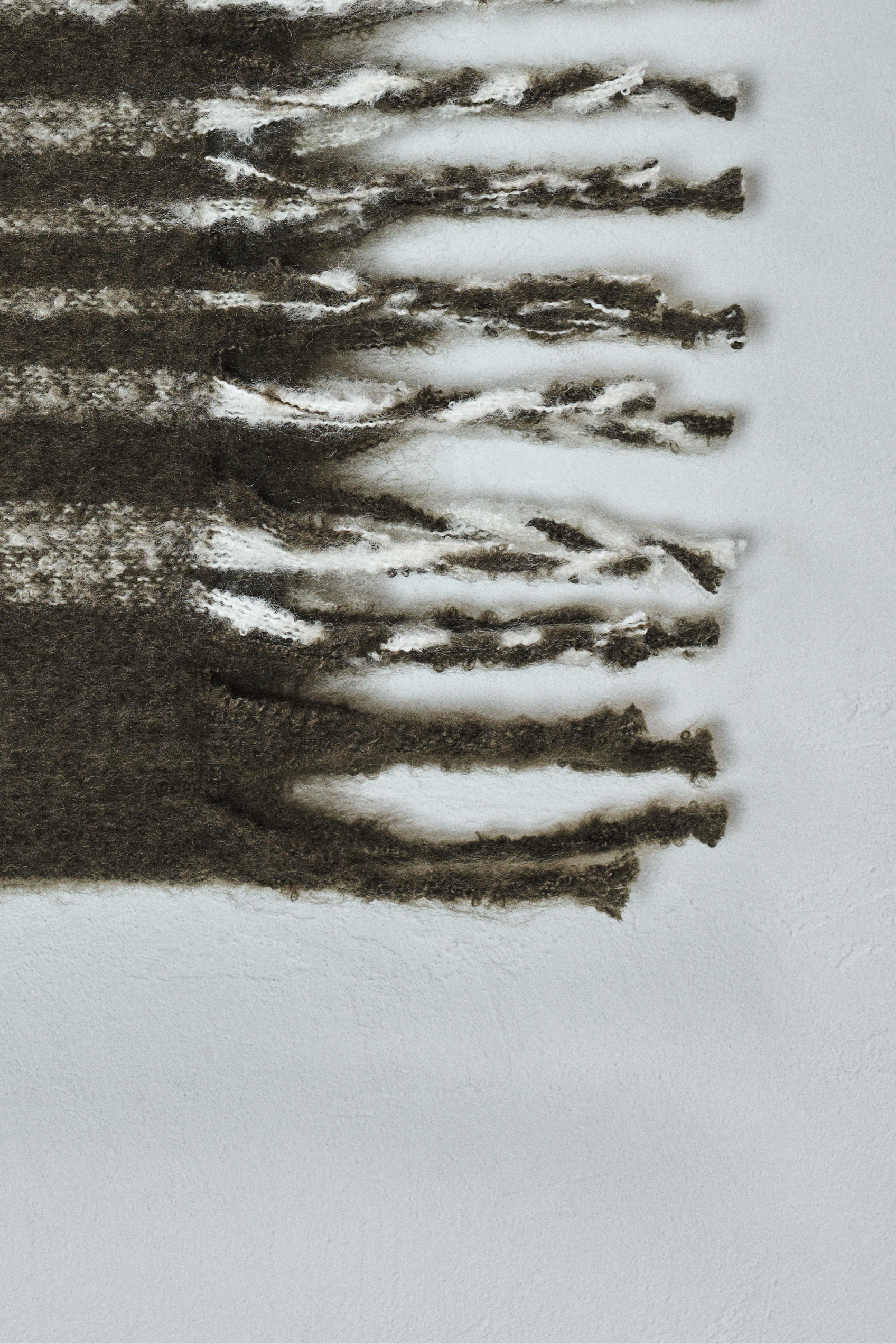 Gestreept sjaal met kwastjes