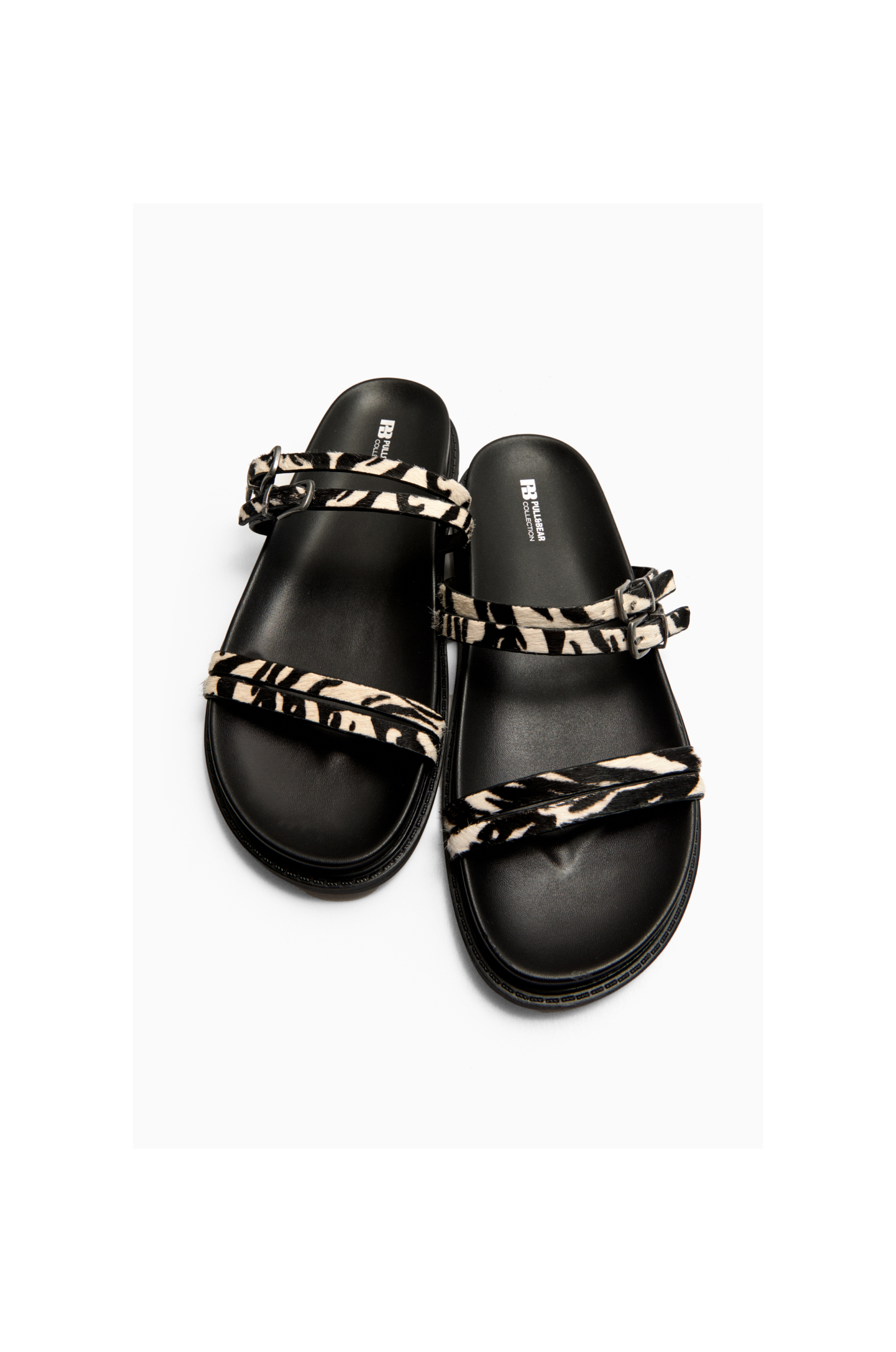 Sandales plates imprimé animal cuir