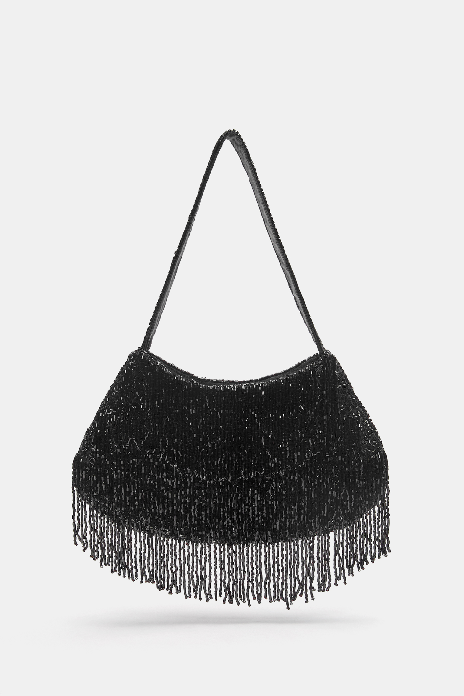 Schoudertas met franjes en kralen