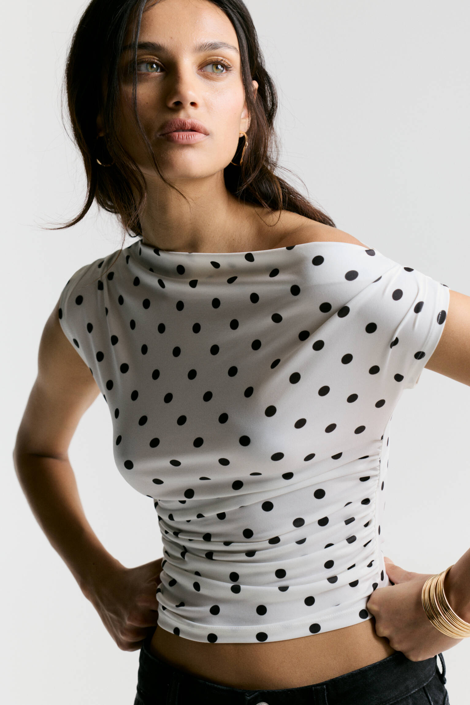 Asymmetric polka dot top