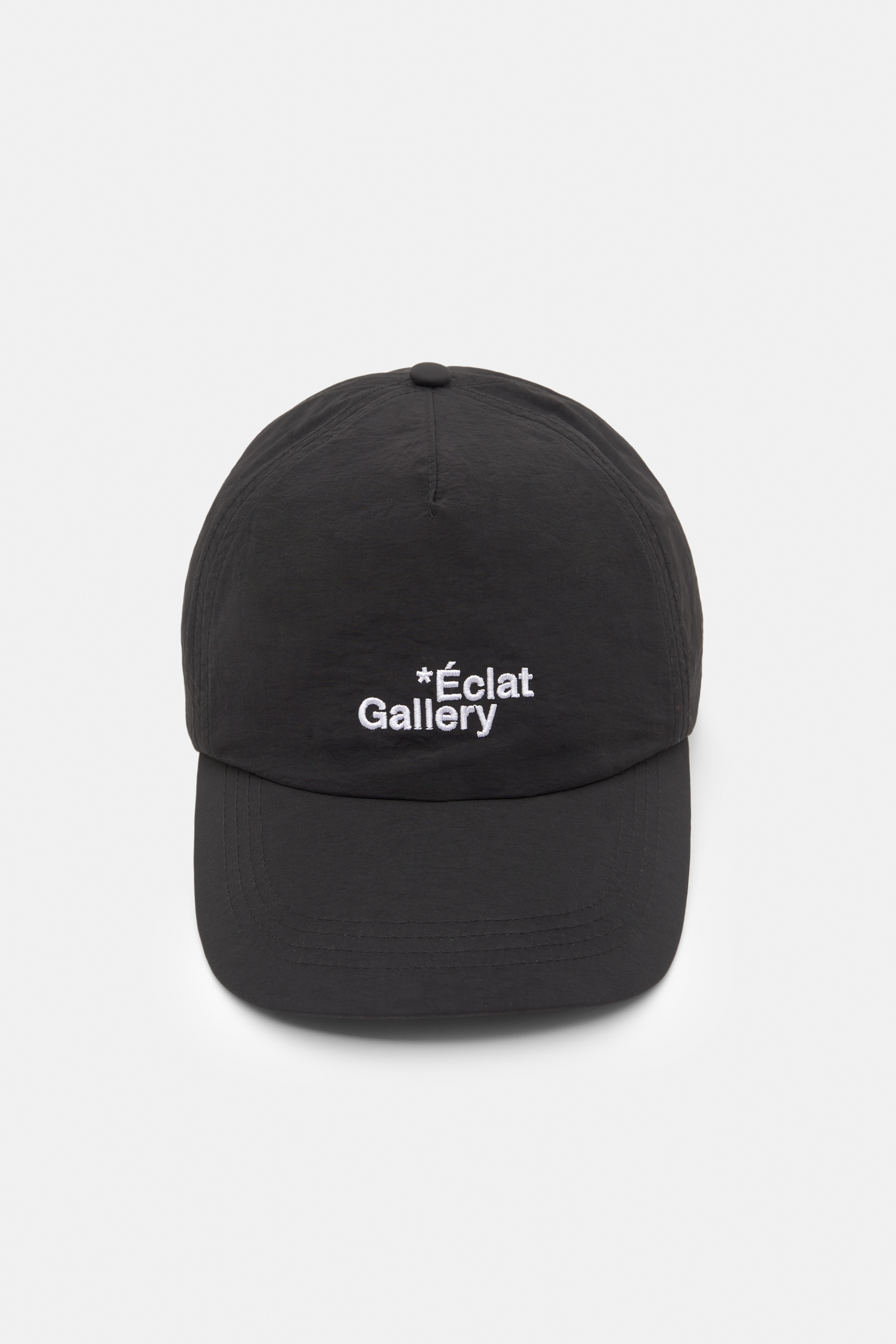 Black technical cap with text