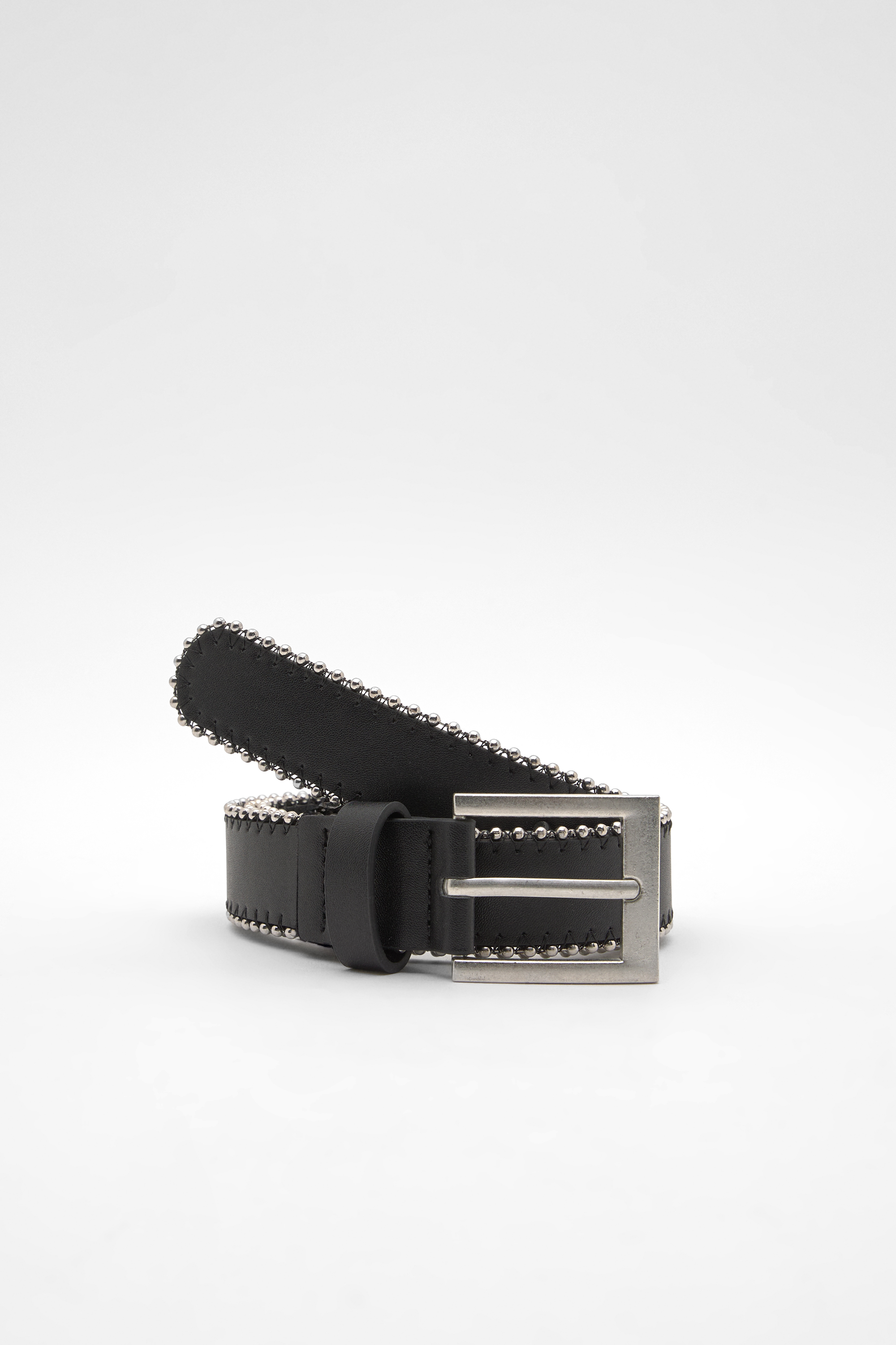 Faux leather belt with metallic edges