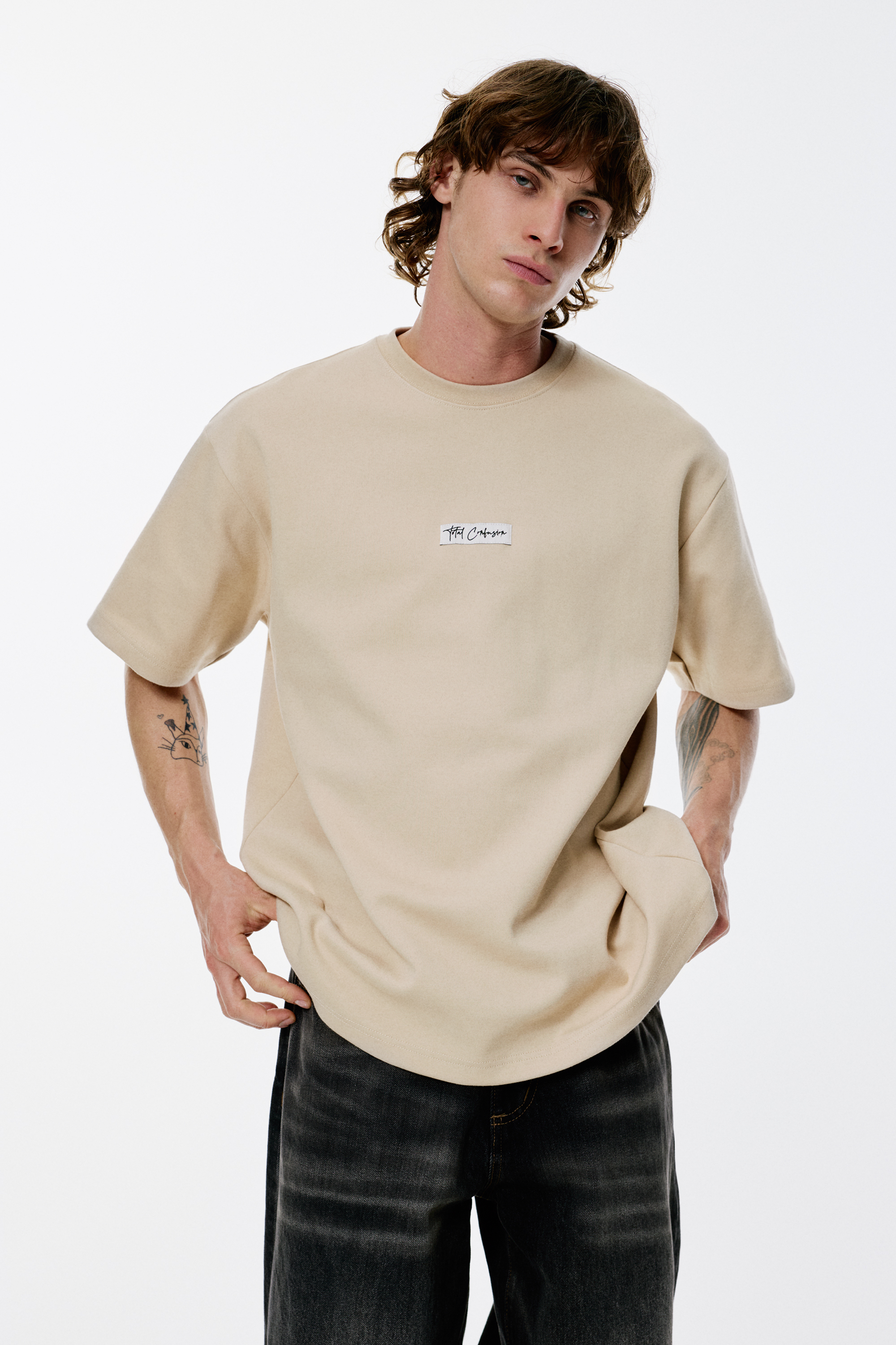 เสื้อสเวตเชิ้ตแขนสั้นผ้าสองหน้าลายกราฟิก