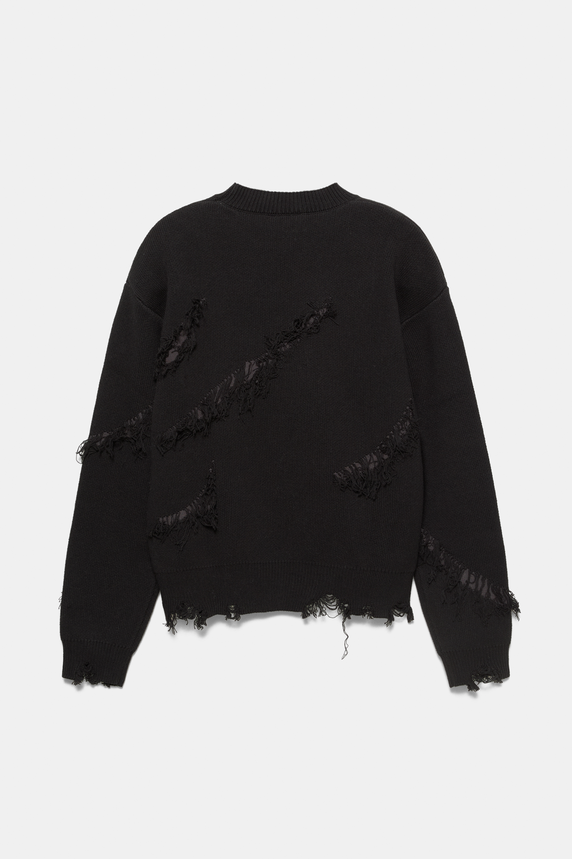 Pull déchiré à franges