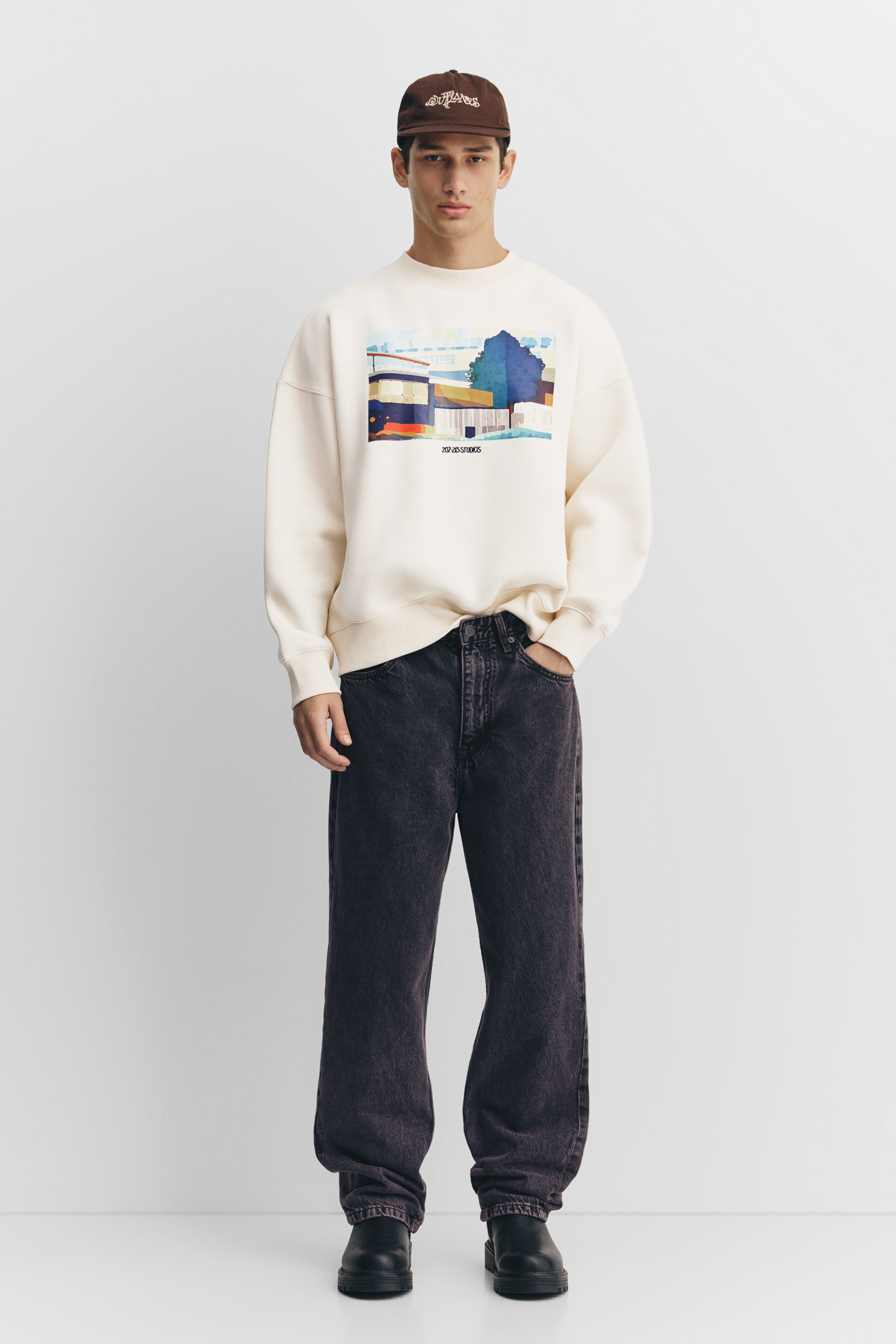 Sweatshirt with embroidered slogan graphic