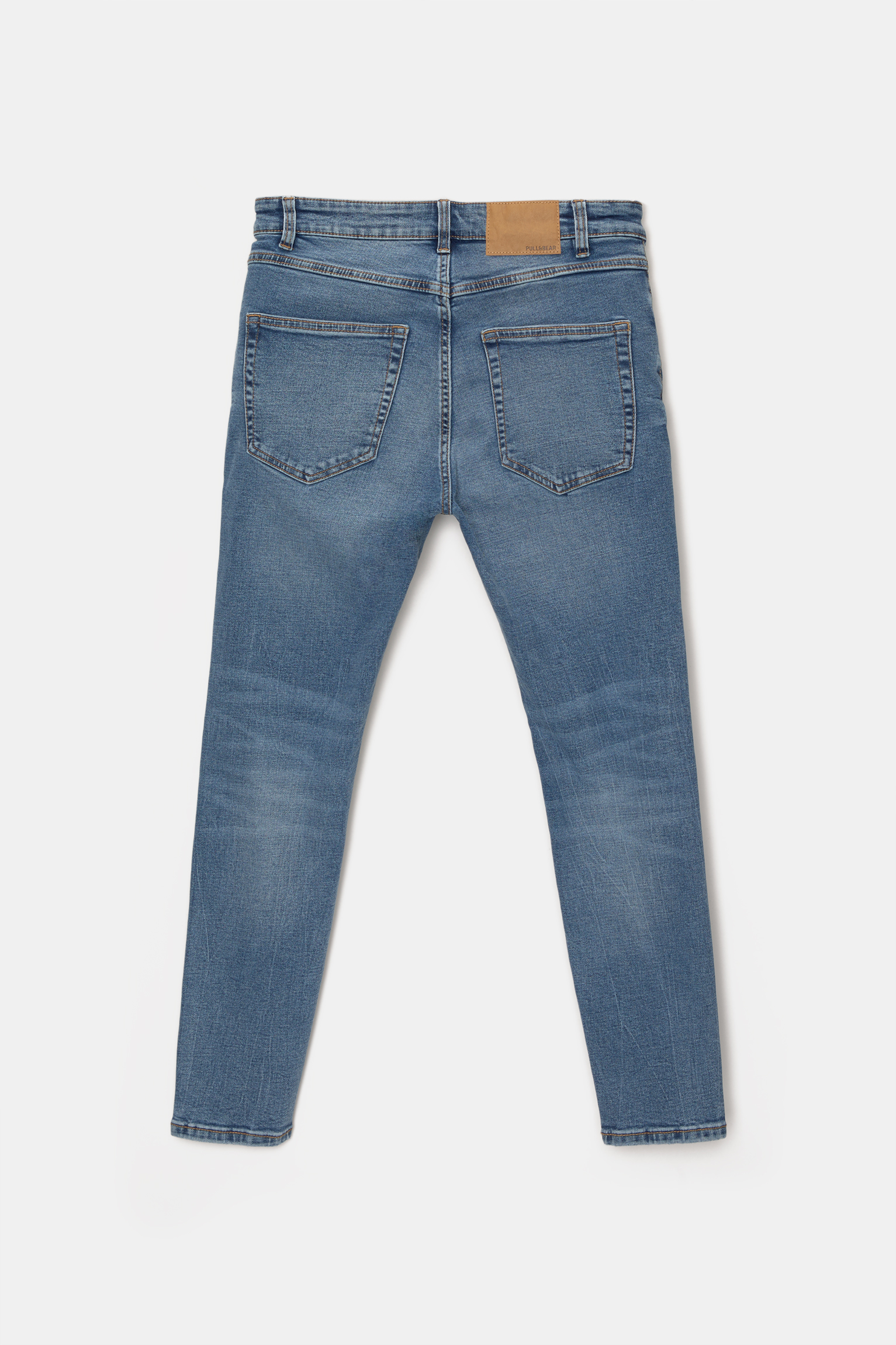 Washed carrot-fit jeans