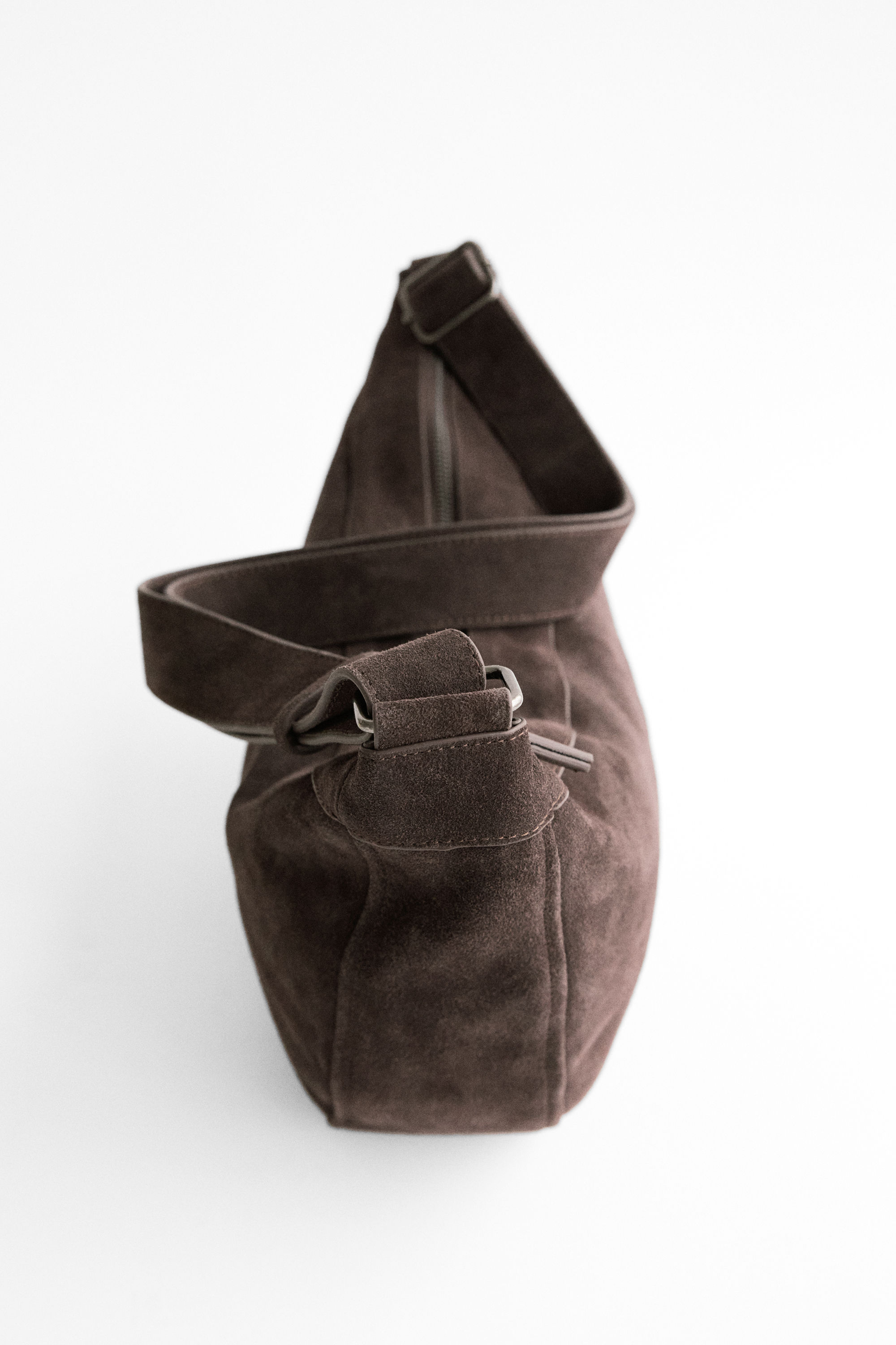 กระเป๋าทรงพระจันทร์ครึ่งเสี้ยวหนัง