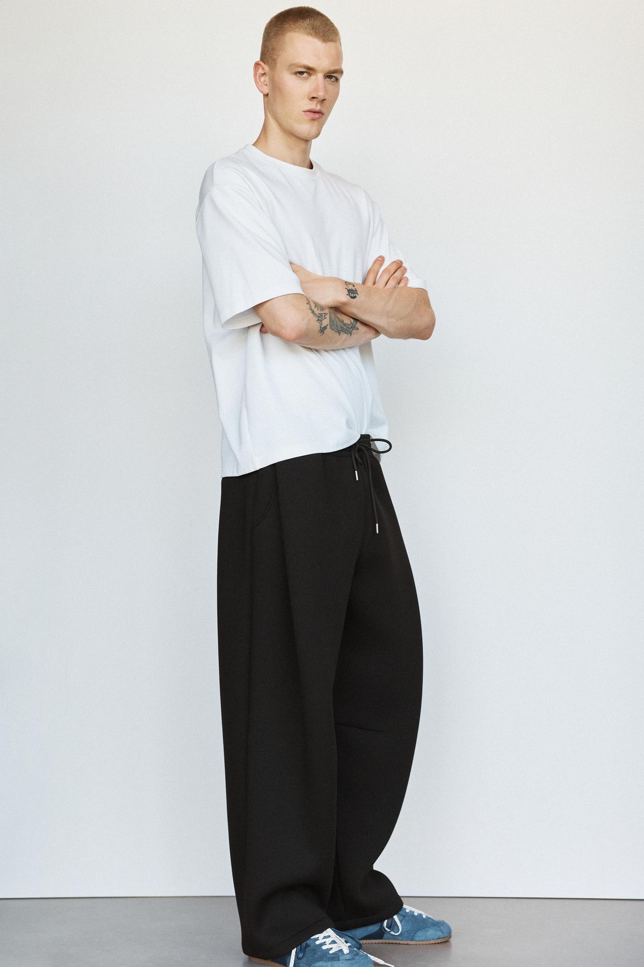 Neoprene-effect darted trousers — Black