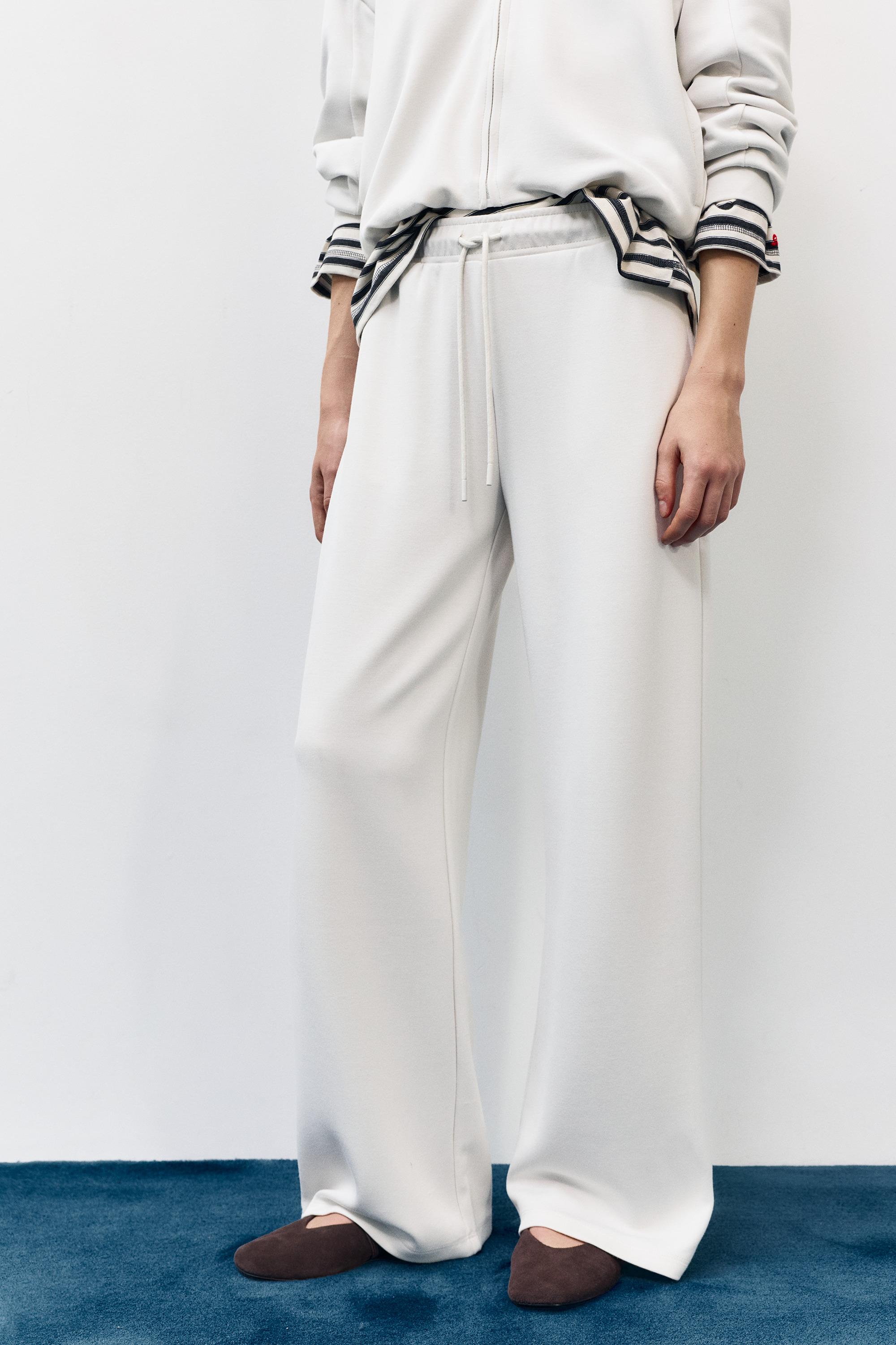 Yumuşak dokunuşlu geniş paça pantolon - Görsel 140