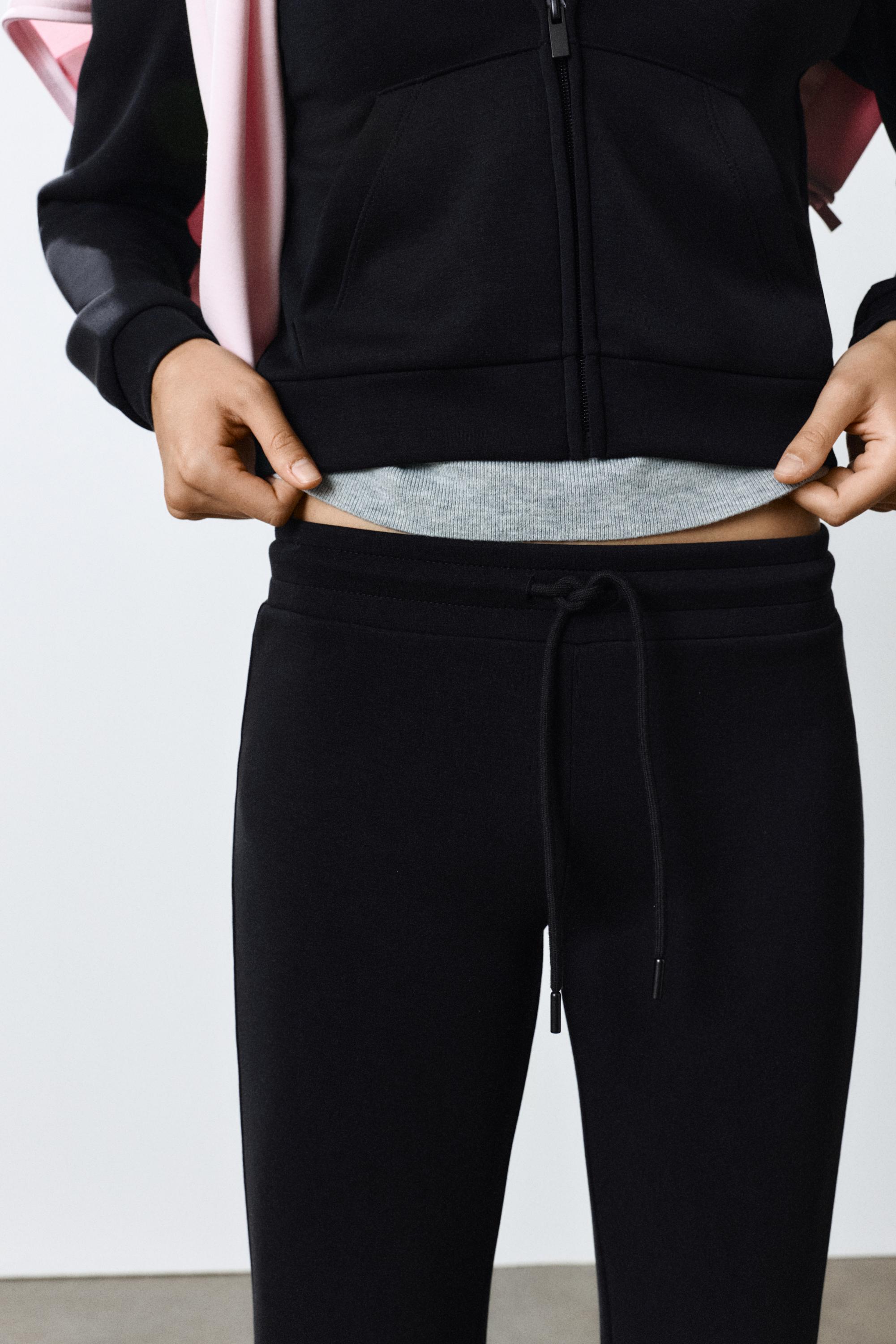 Modal flared trousers — Black
