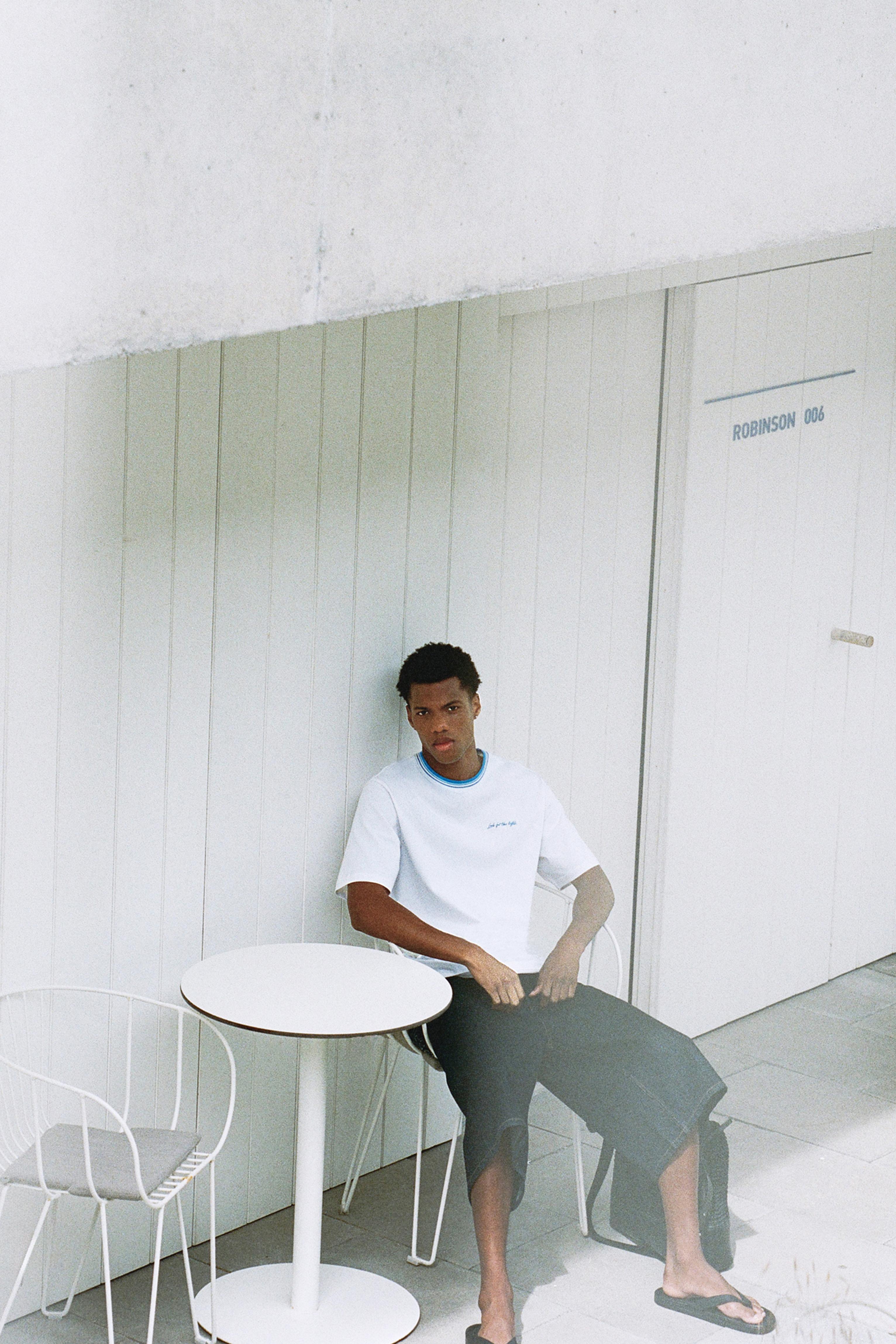 Embroidered slogan T-shirt — Off white