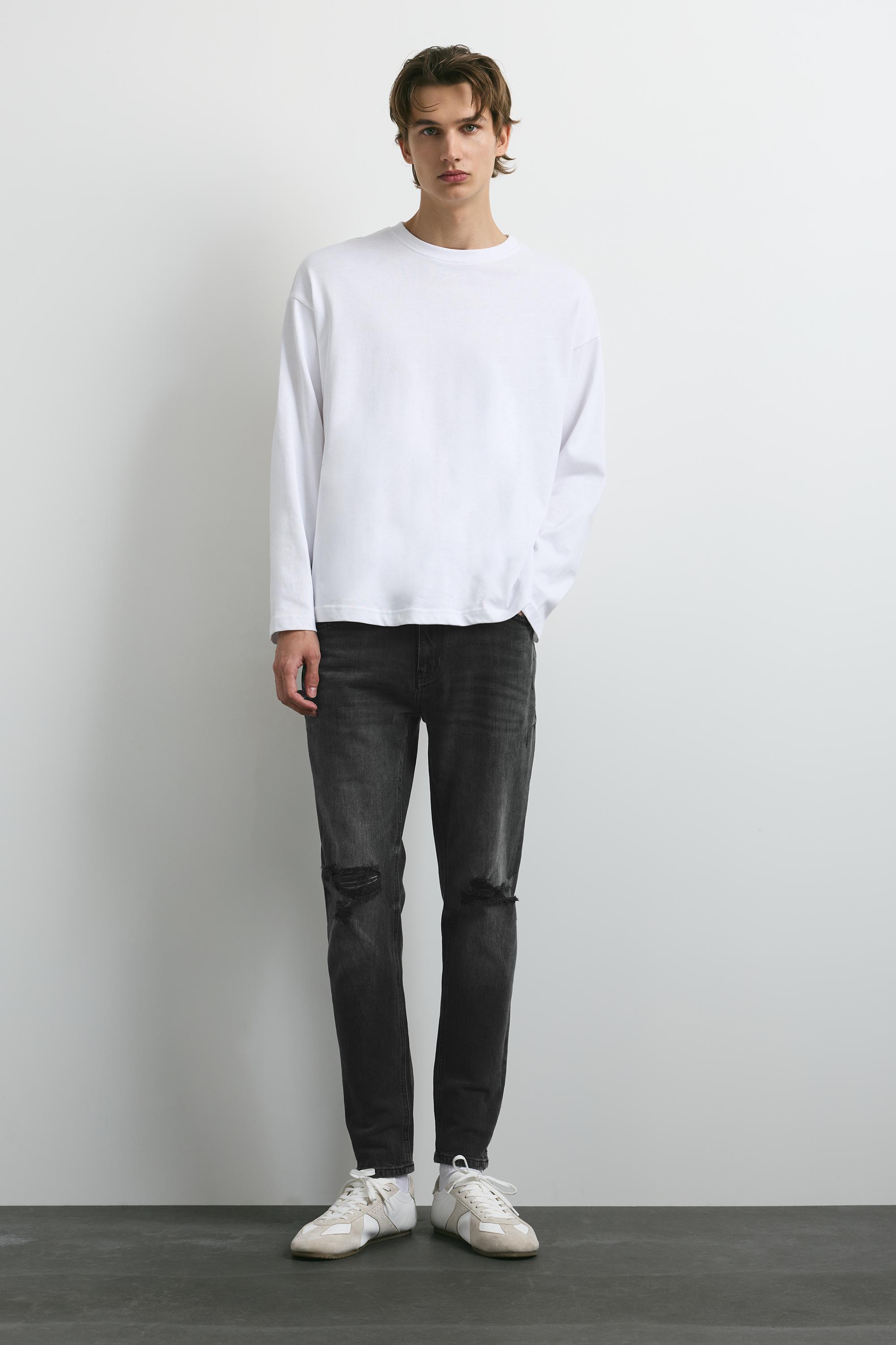 Ripped skinny jeans — Faded black