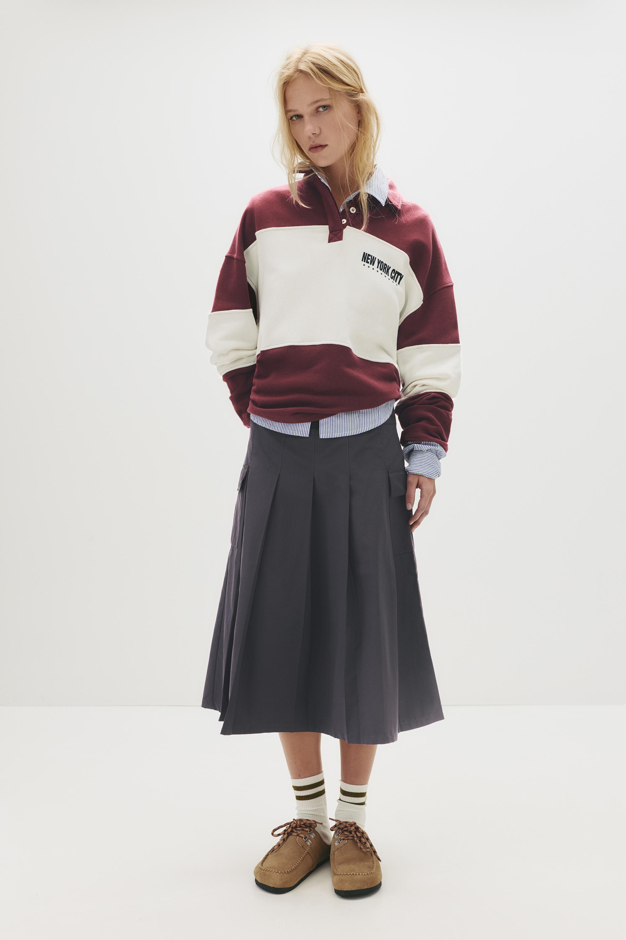 Midirock Mit Falten Und Taschen