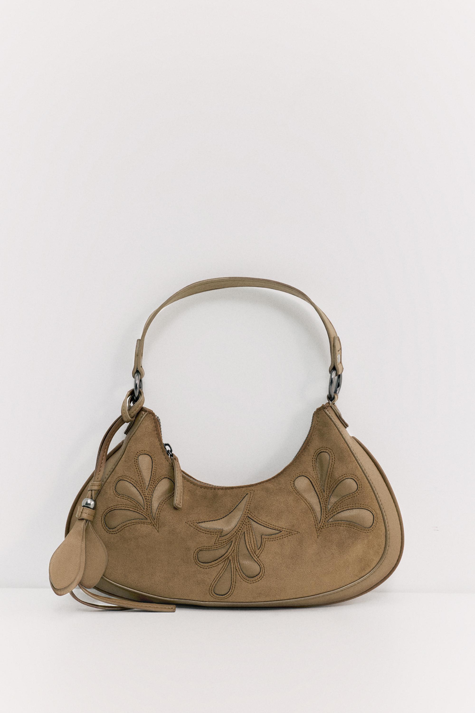 Embellished shoulder bag — Leather