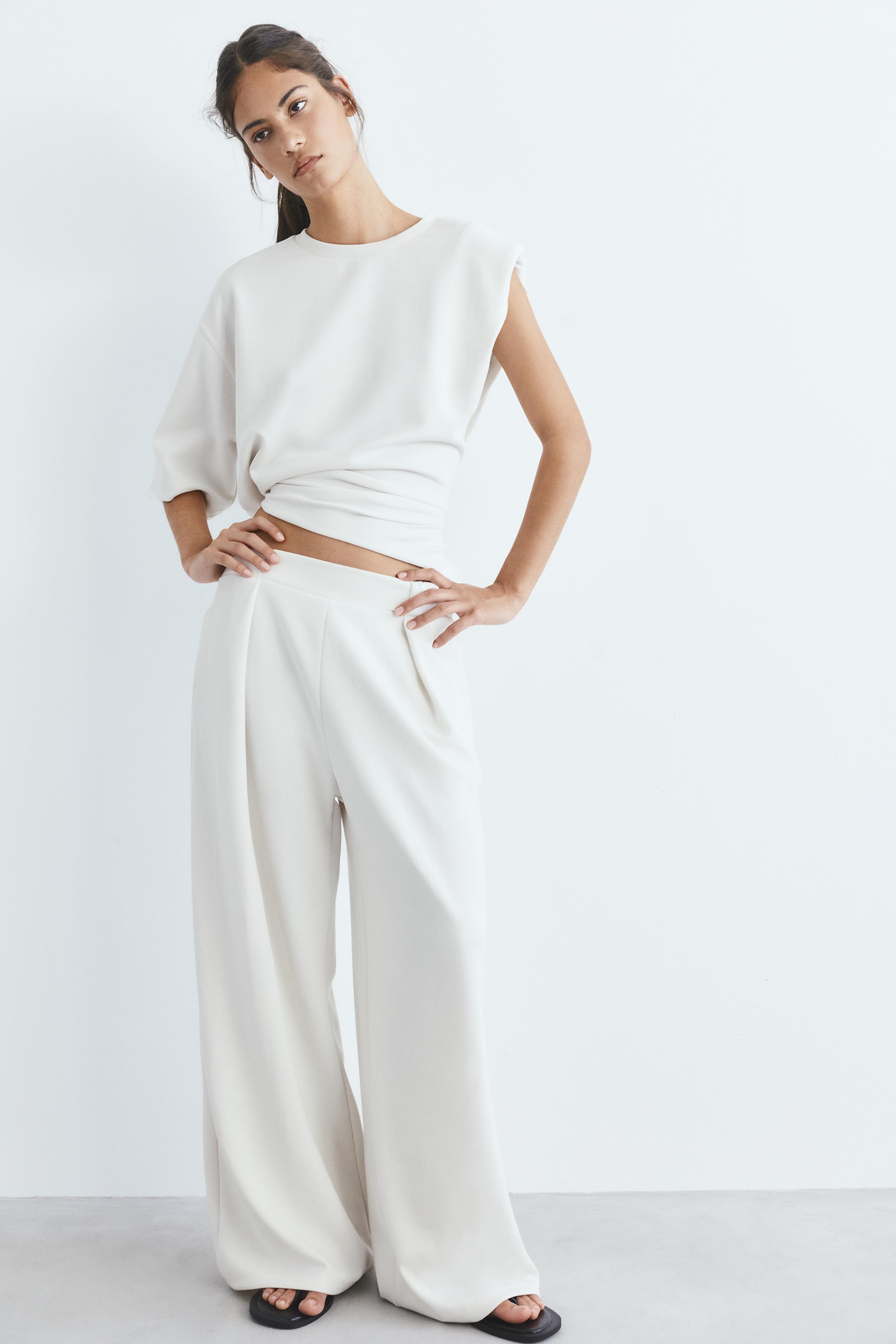 Soft-touch wide-leg darted trousers — Ecru
