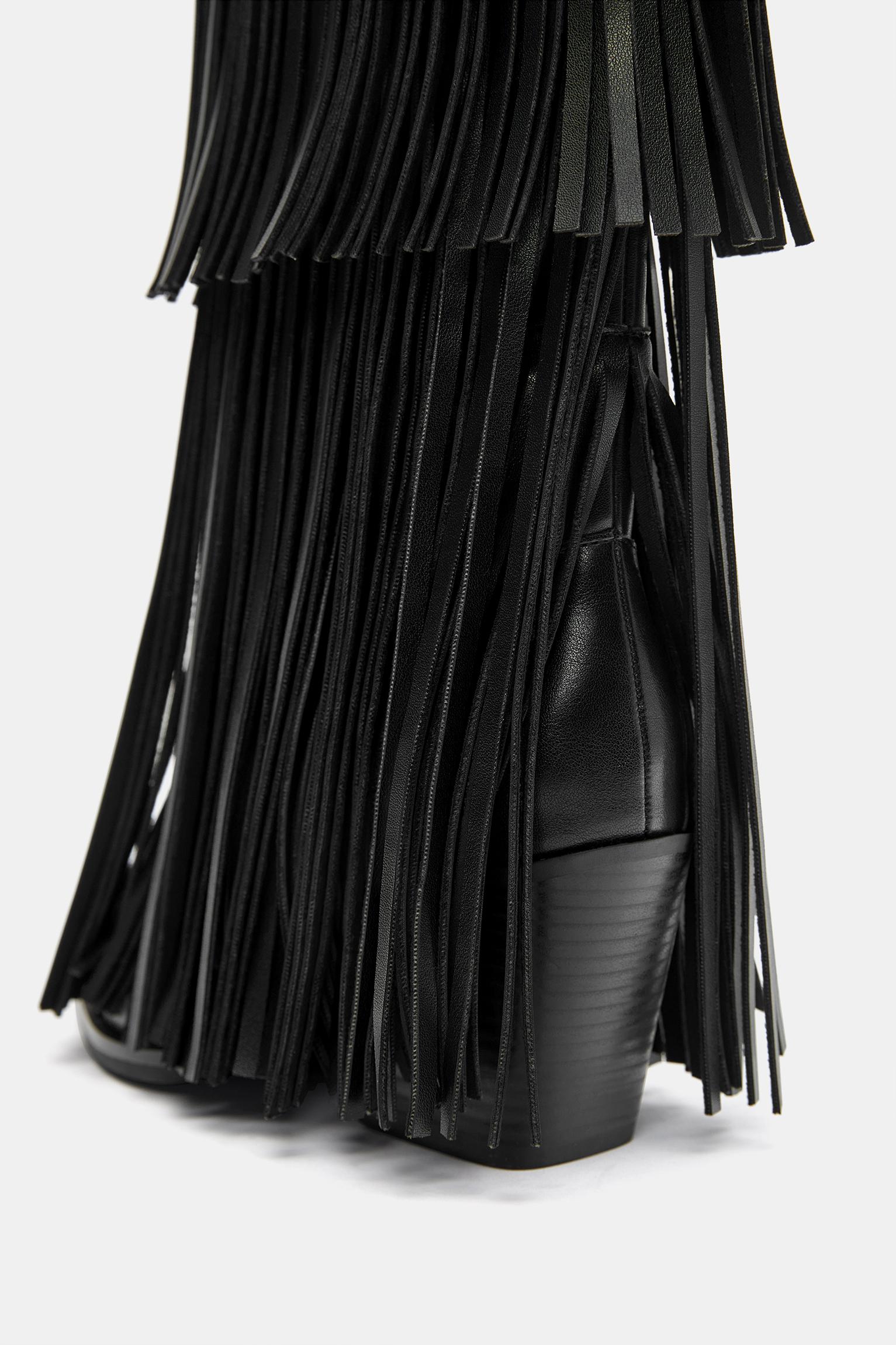 Fringed cowboy boots — Black