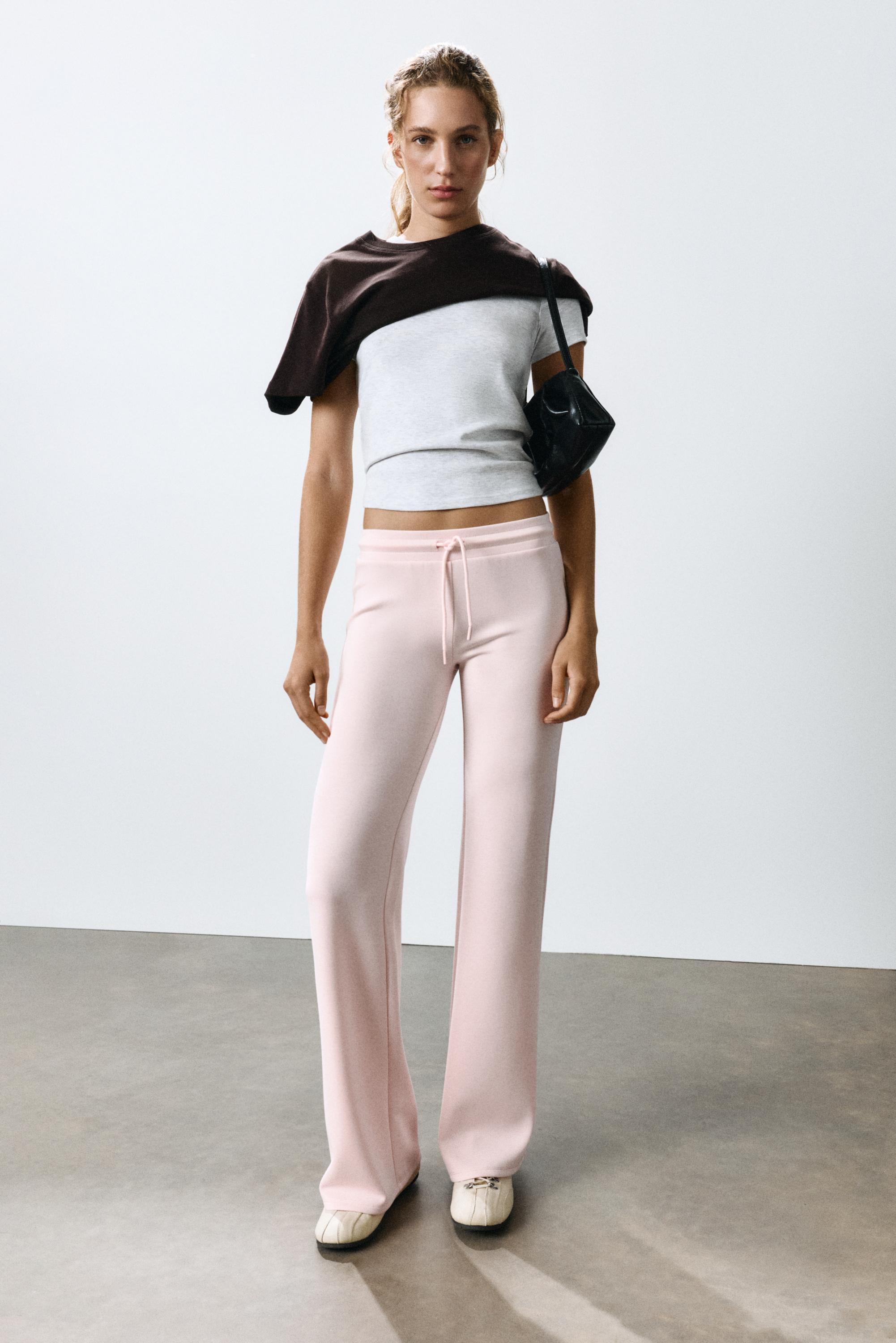 Modal flared trousers — Pastel pink
