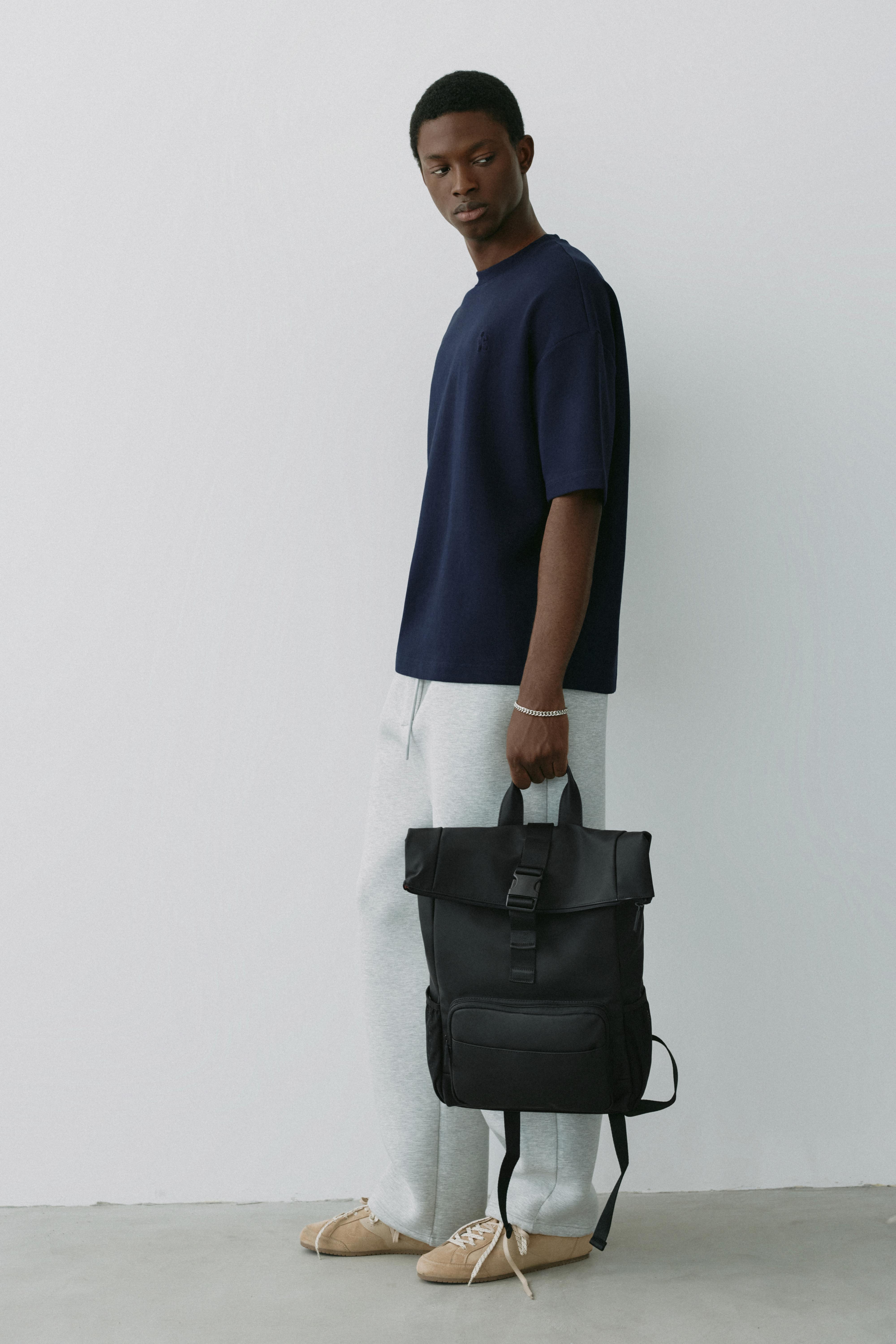 Rubberised flap backpack — Black
