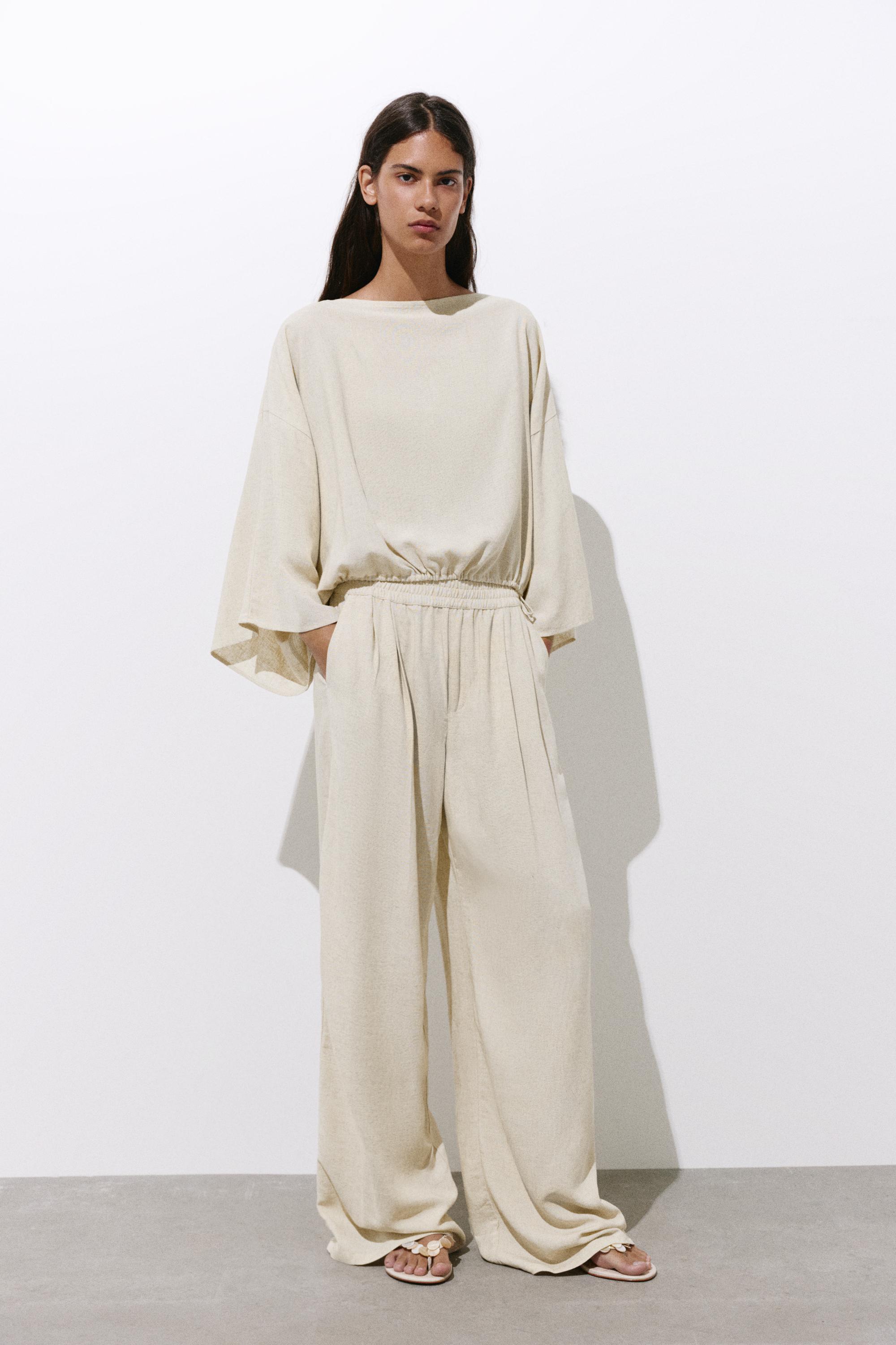 Flowing darted trousers — Sand
