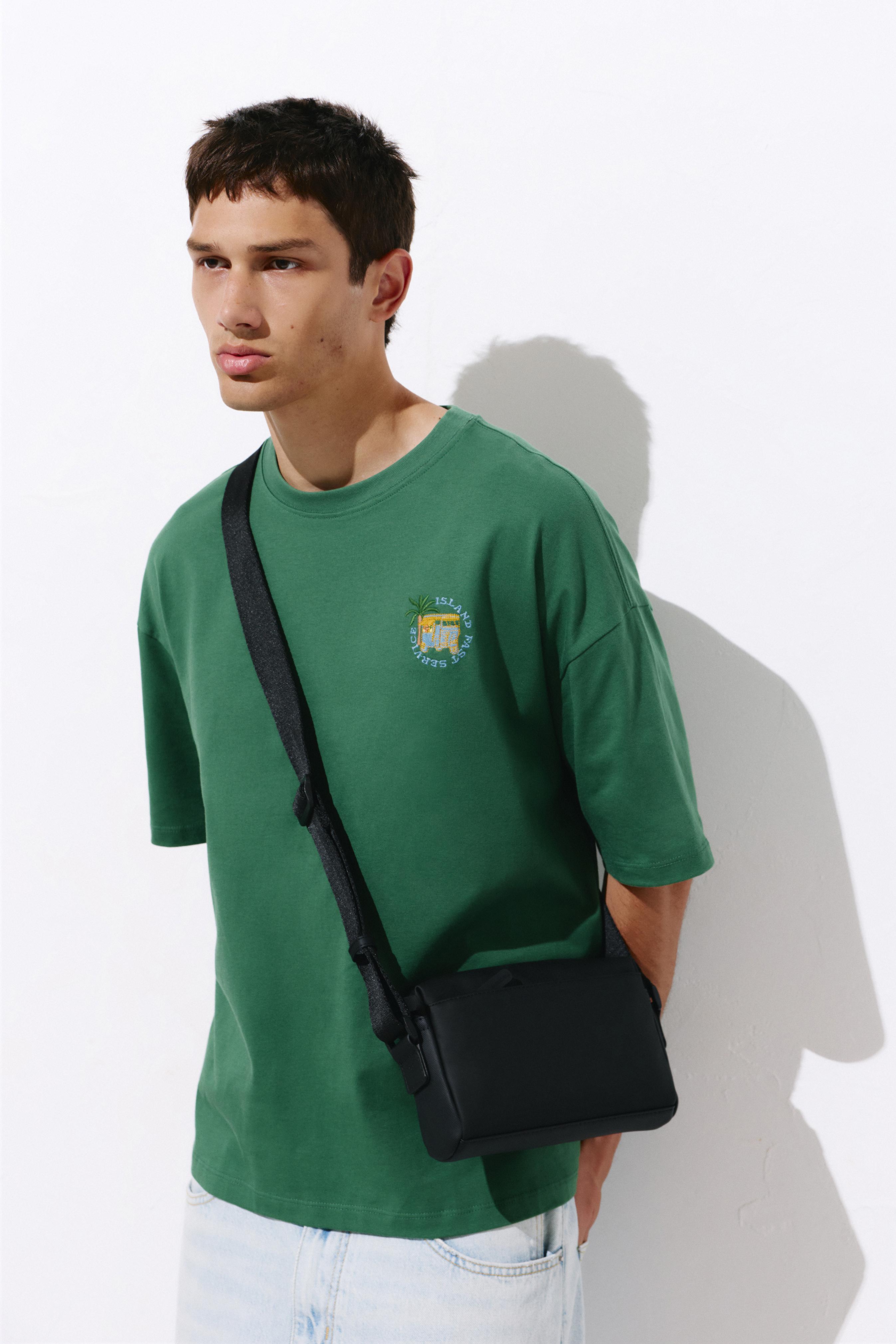 Rubberised crossbody bag — Black
