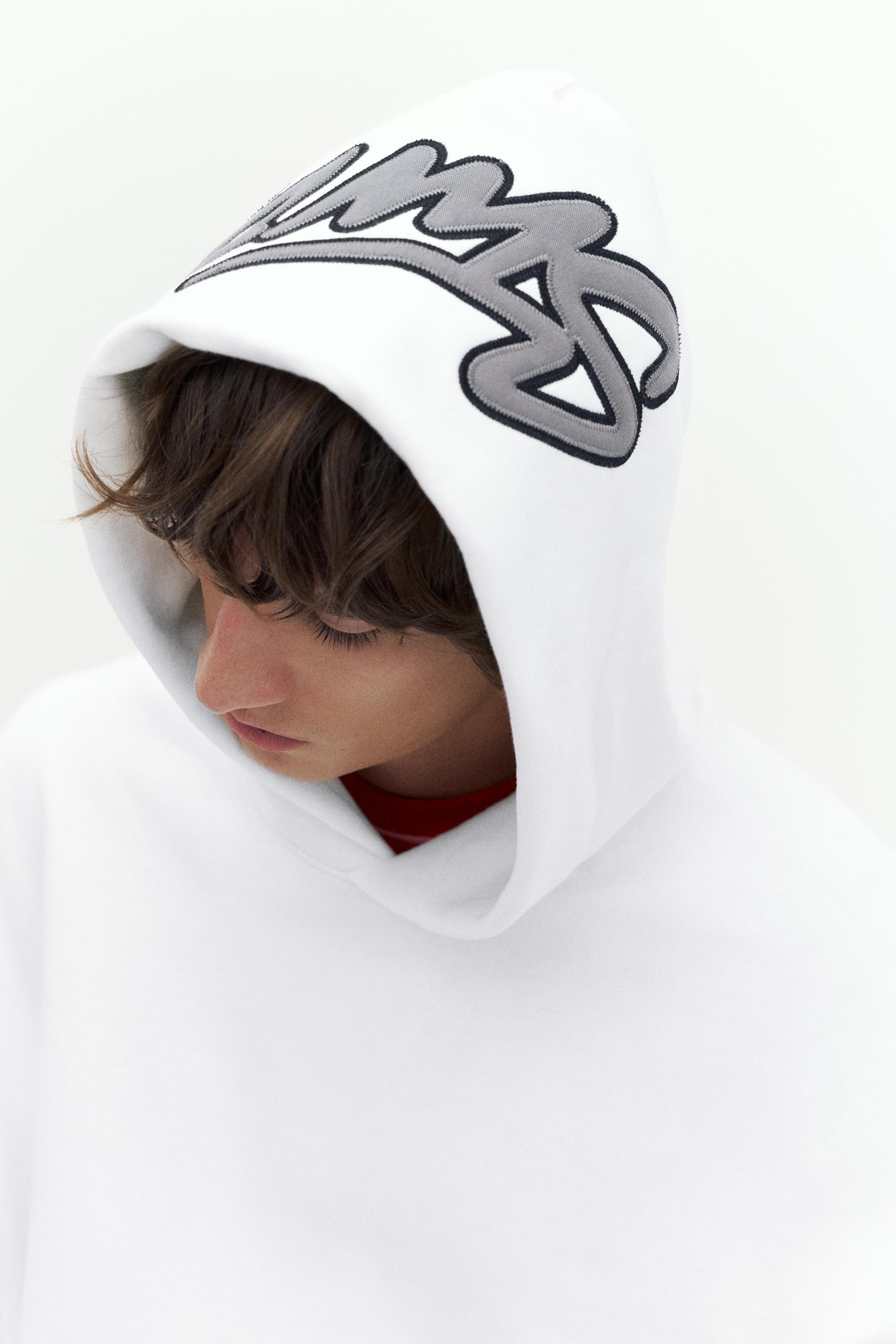 STWD boxy-fit logo hoodie — Off white