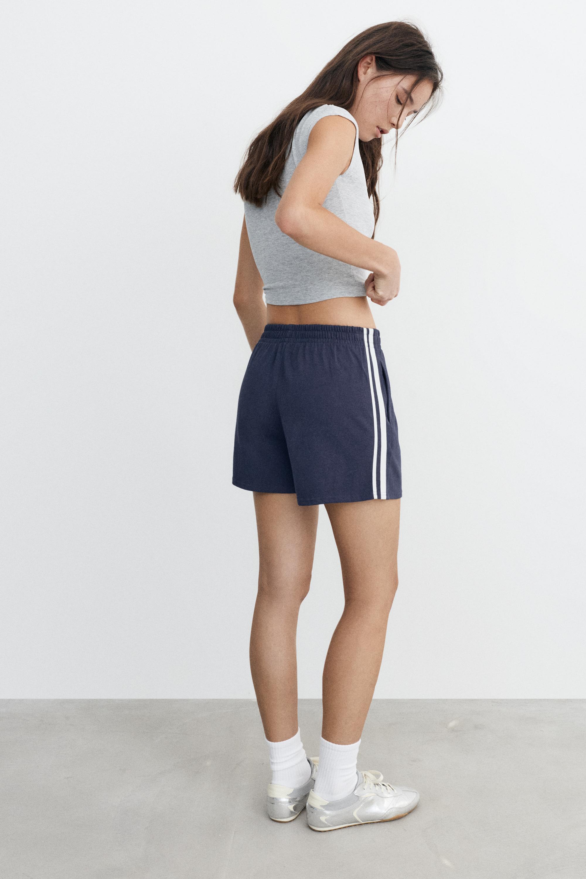 Sports shorts with side stripes — Dark navy