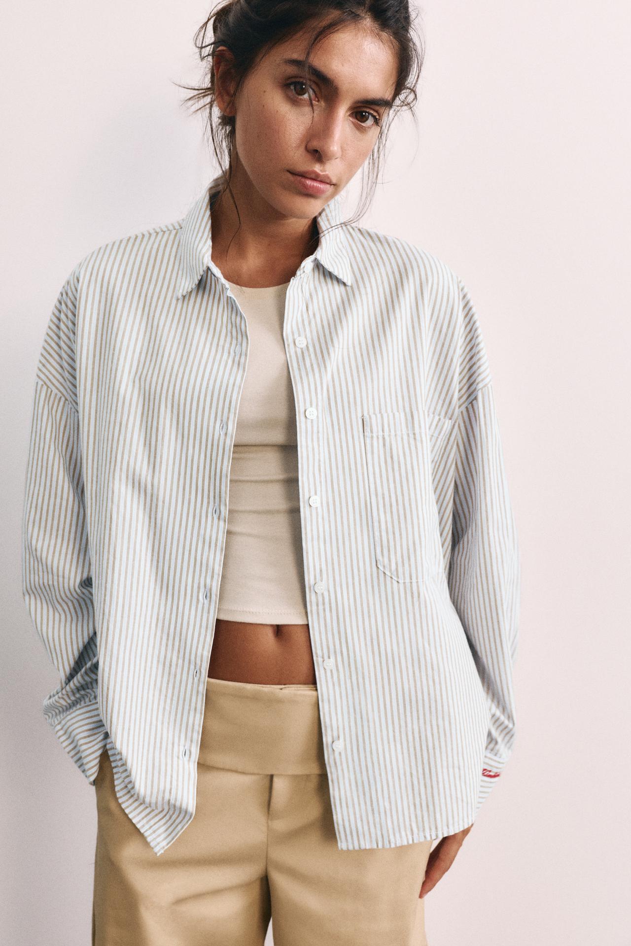 Embroidered striped shirt — Pastel blue