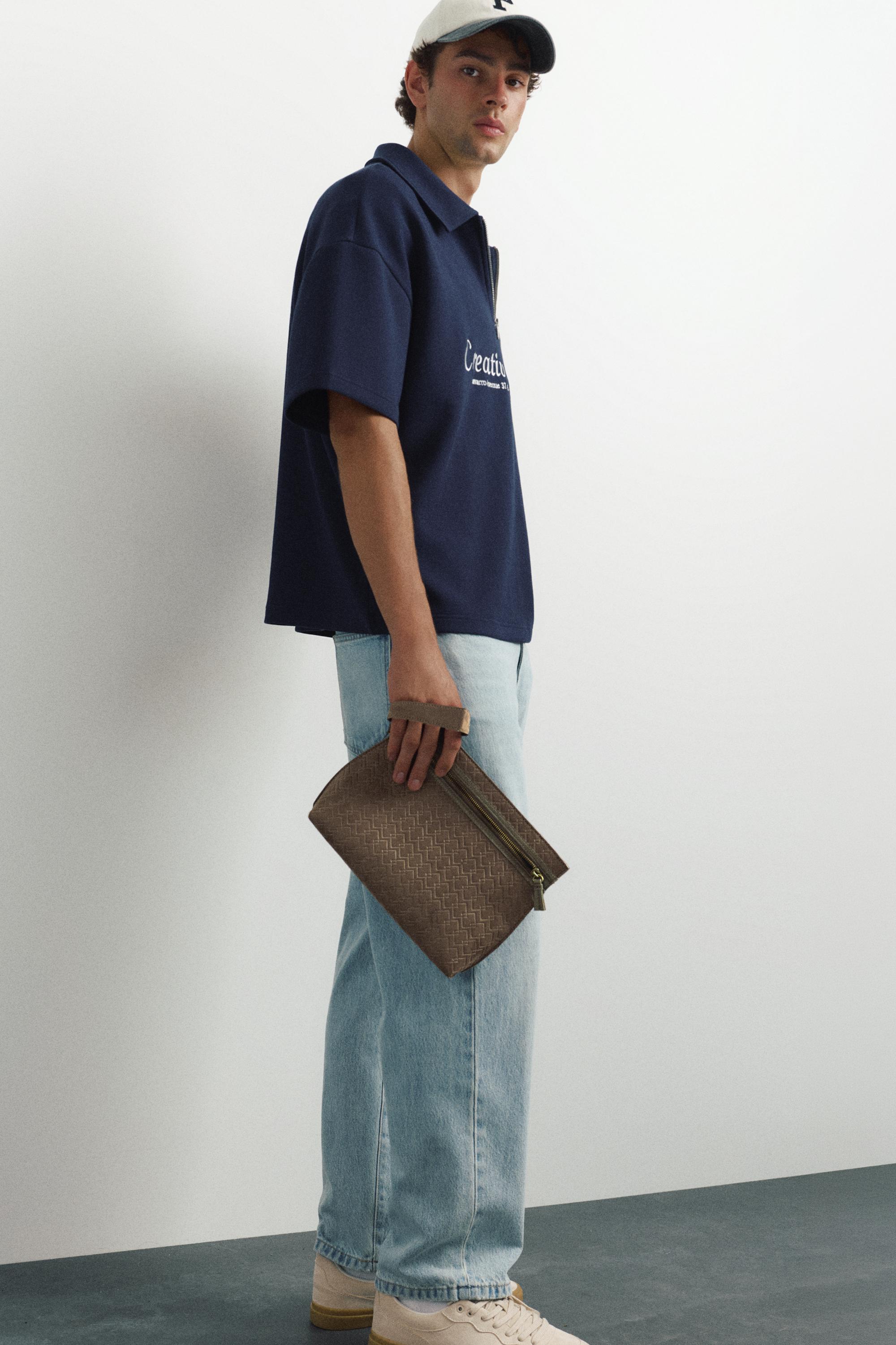 Embossed handle clutch bag — Brown