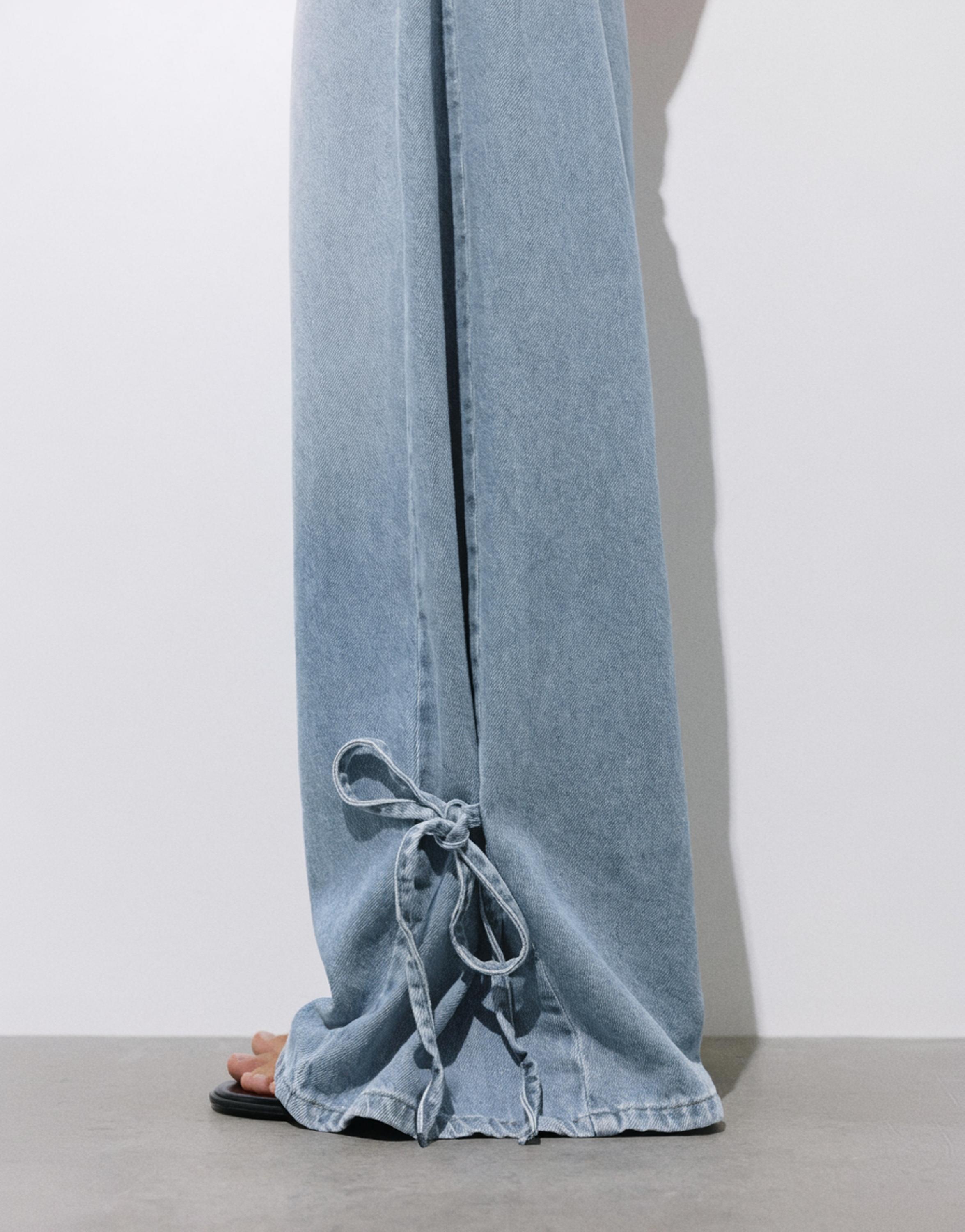 Wide-leg jeans with bows — Pale blue