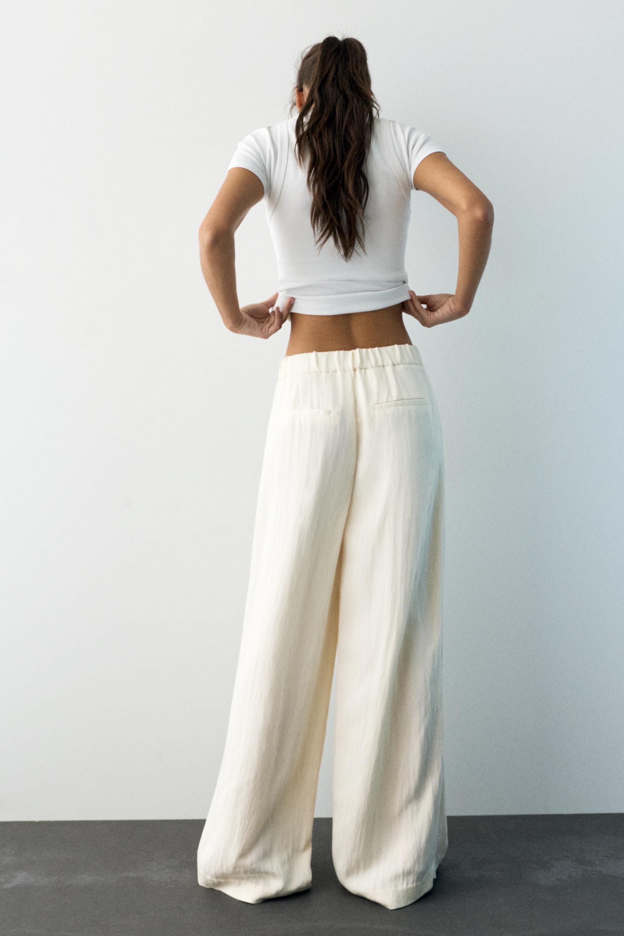 Düğmeli ve fermuarlı, kemer tokalı, önü pensli, elastik belli, tailored fit pantolon. - Görsel 25