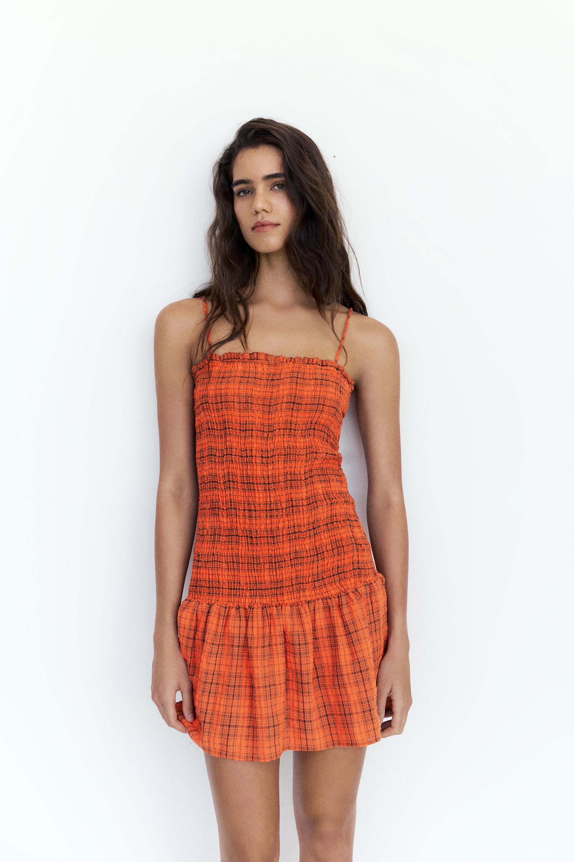 Check smocked dress — Red