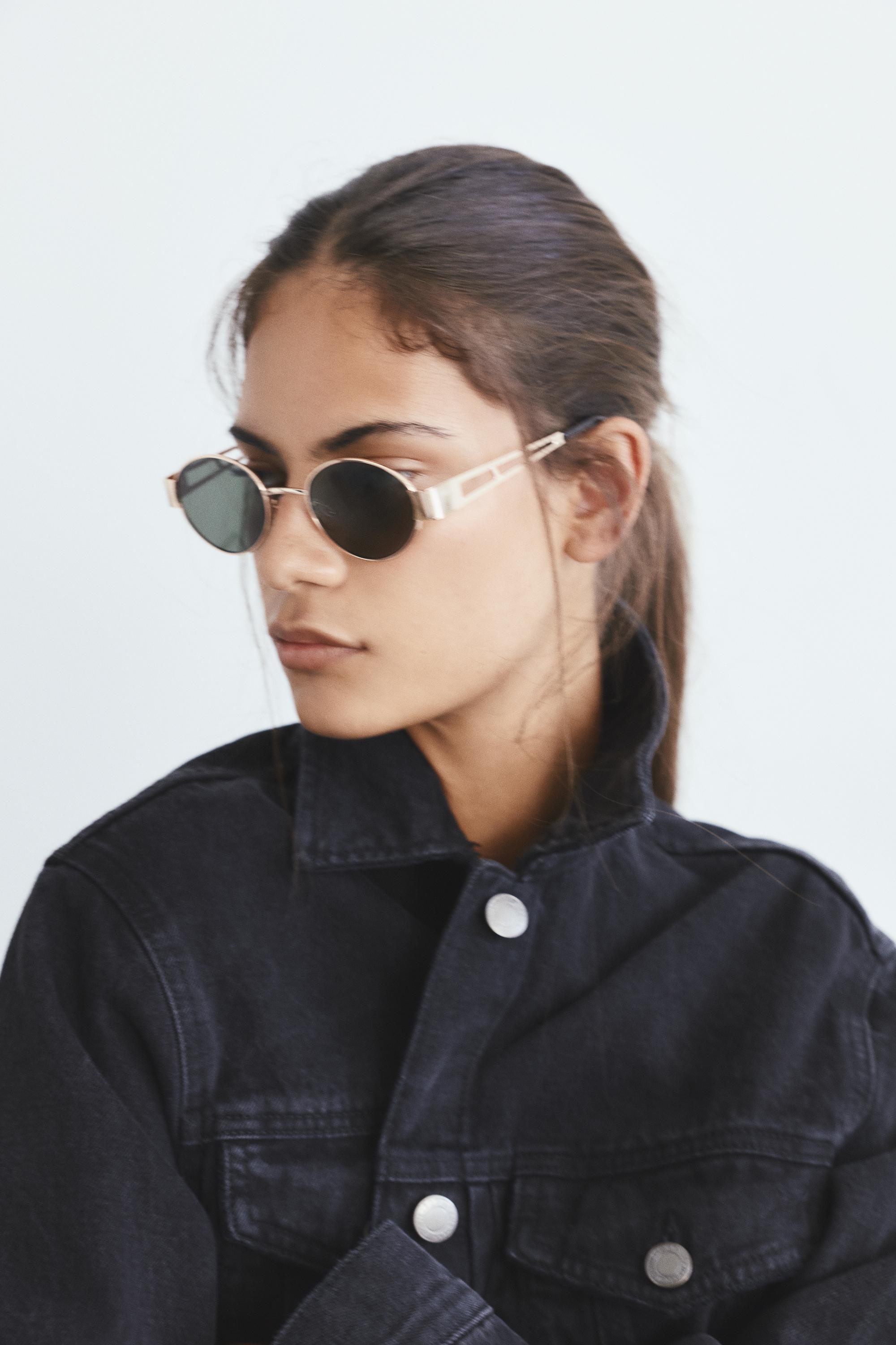 Metallic oval sunglasses — Gold