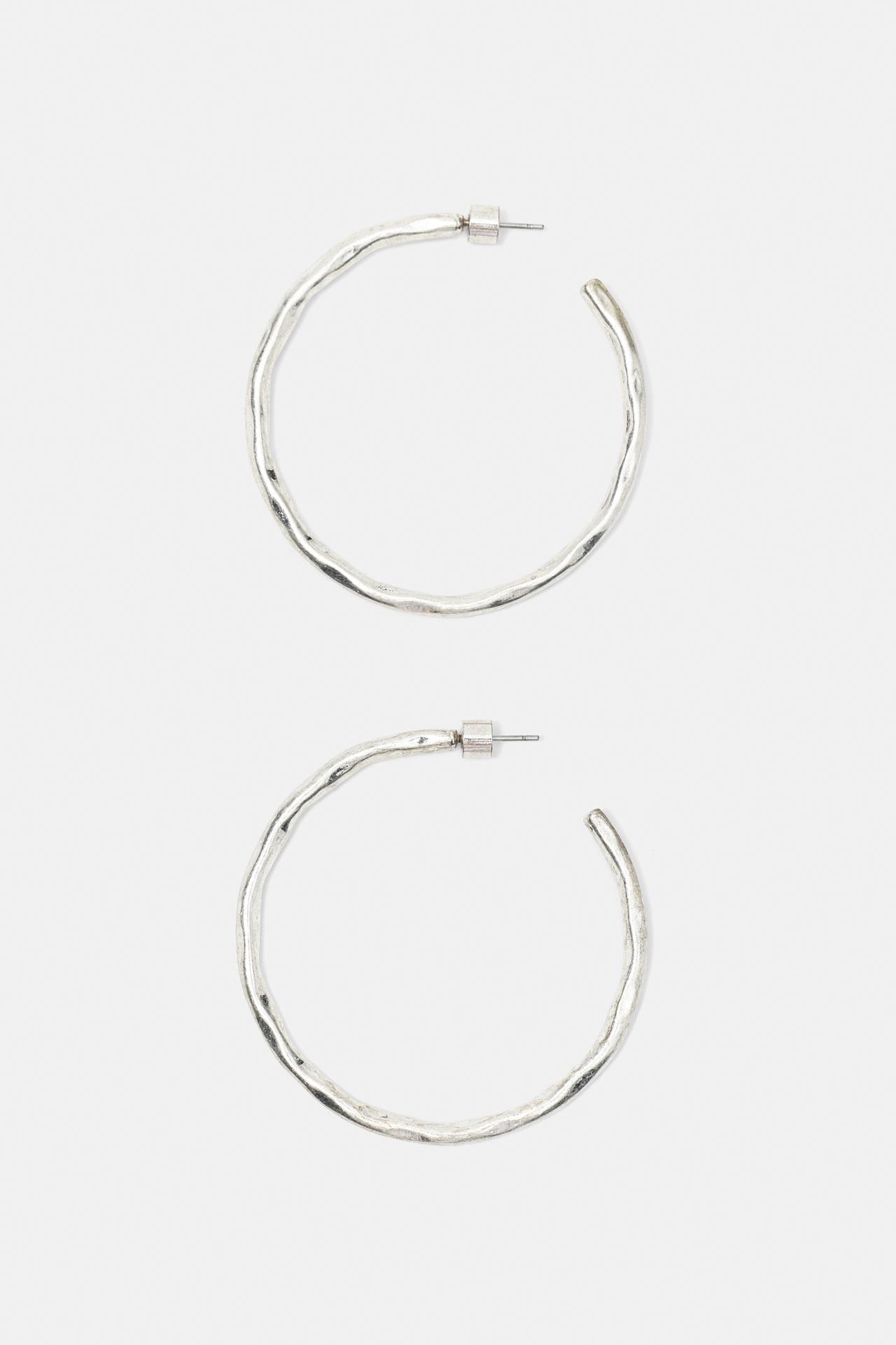 Textured hoop earrings — Silver