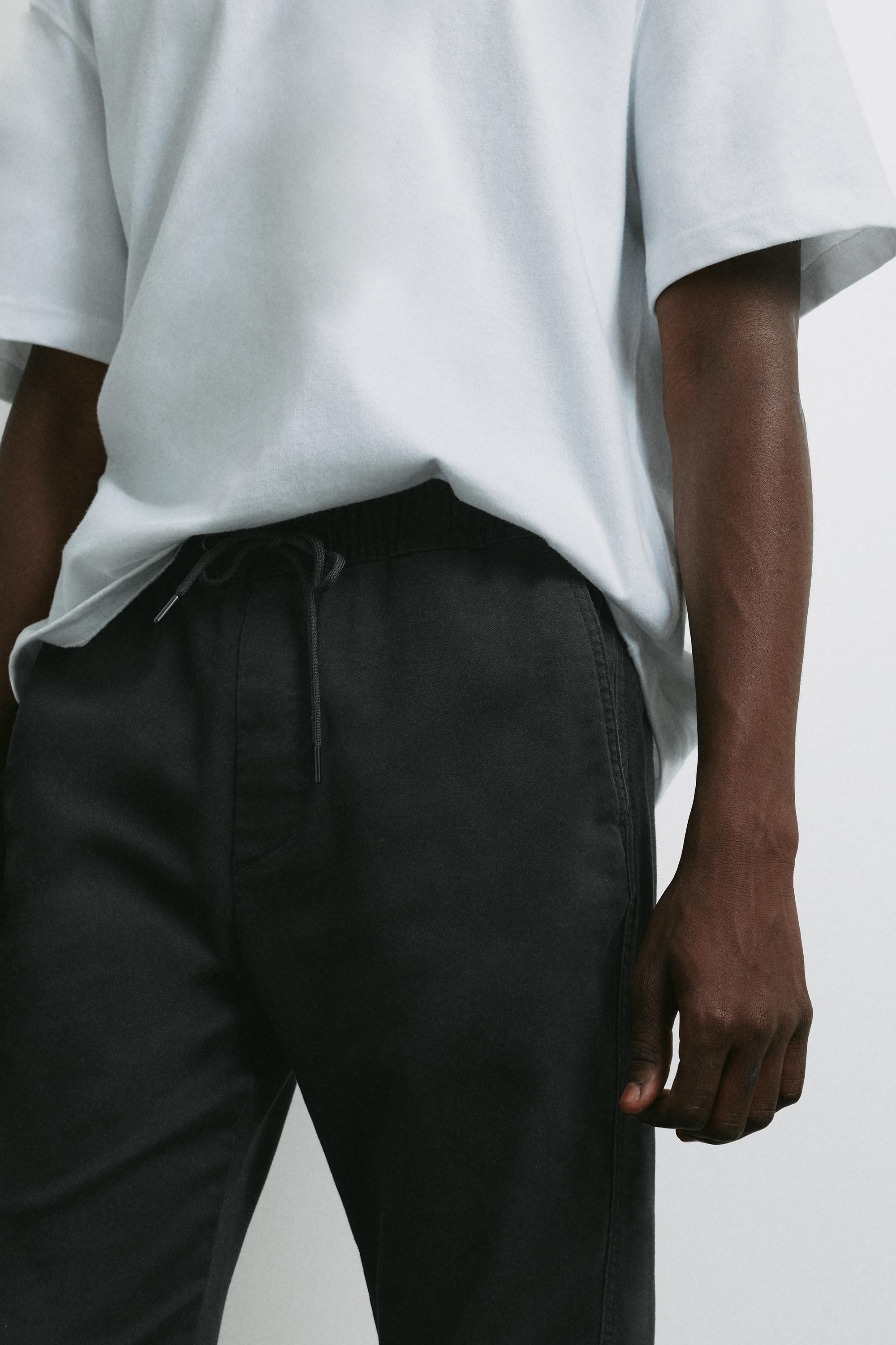 Regular fit jogging trousers — Black