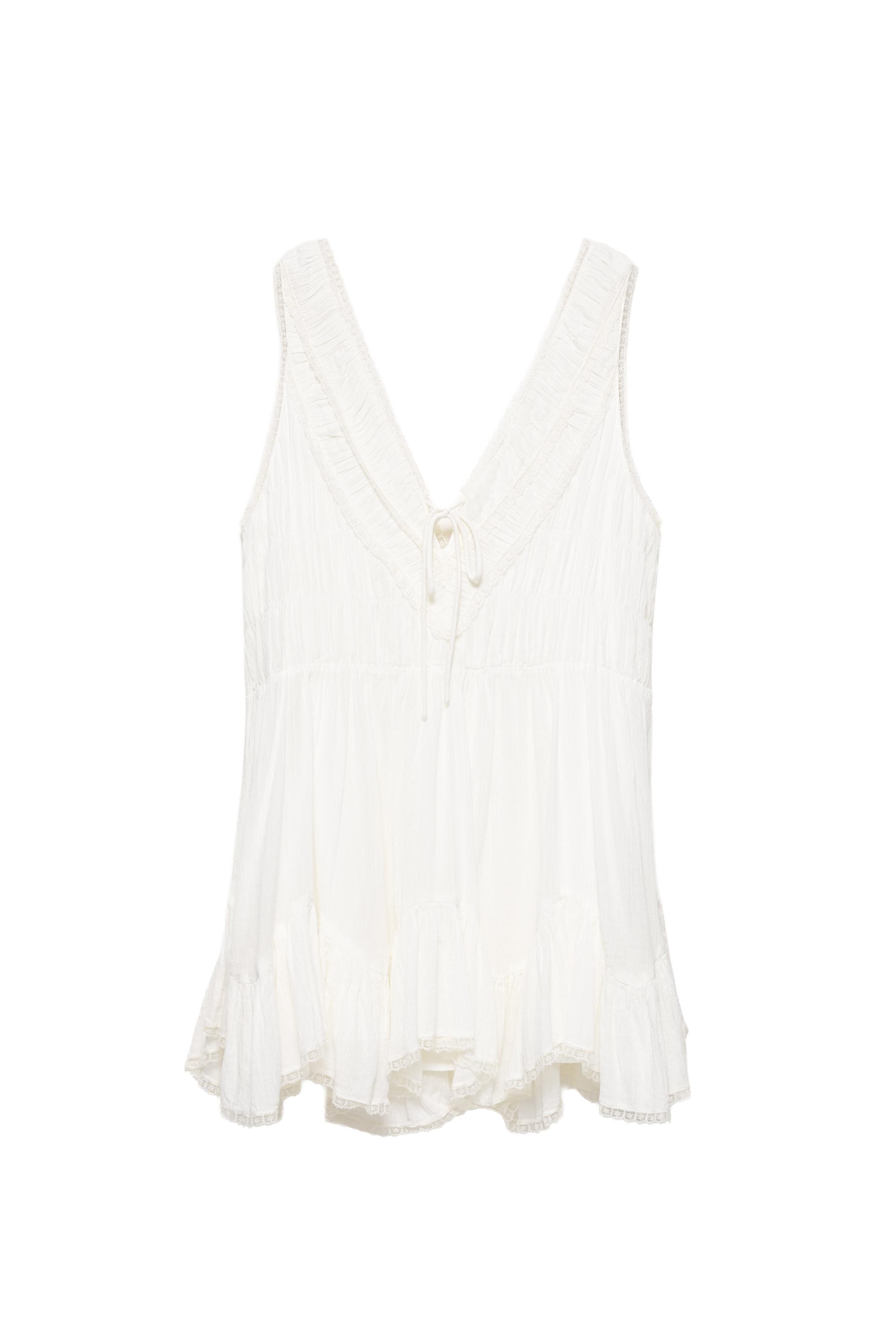 Vestido corto blanco volantes