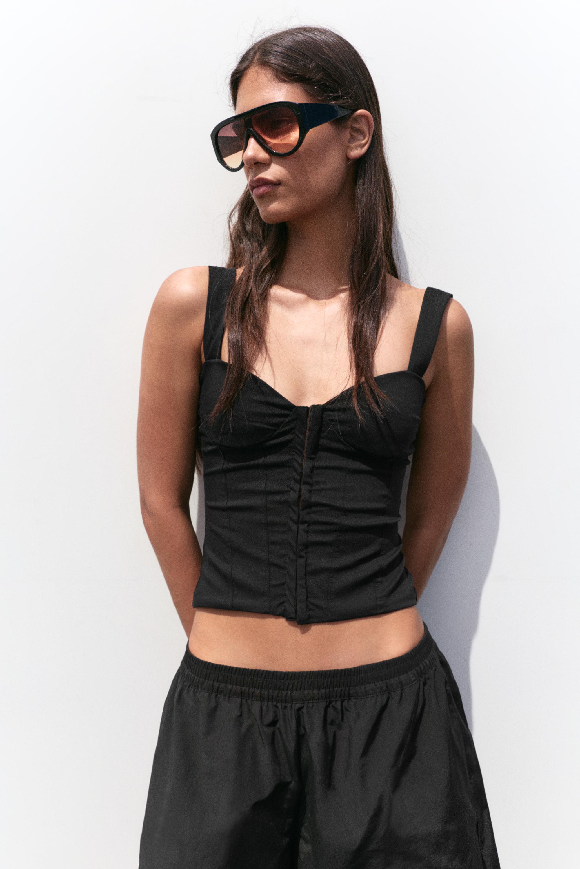 Strappy corsetry-inspired top — Black