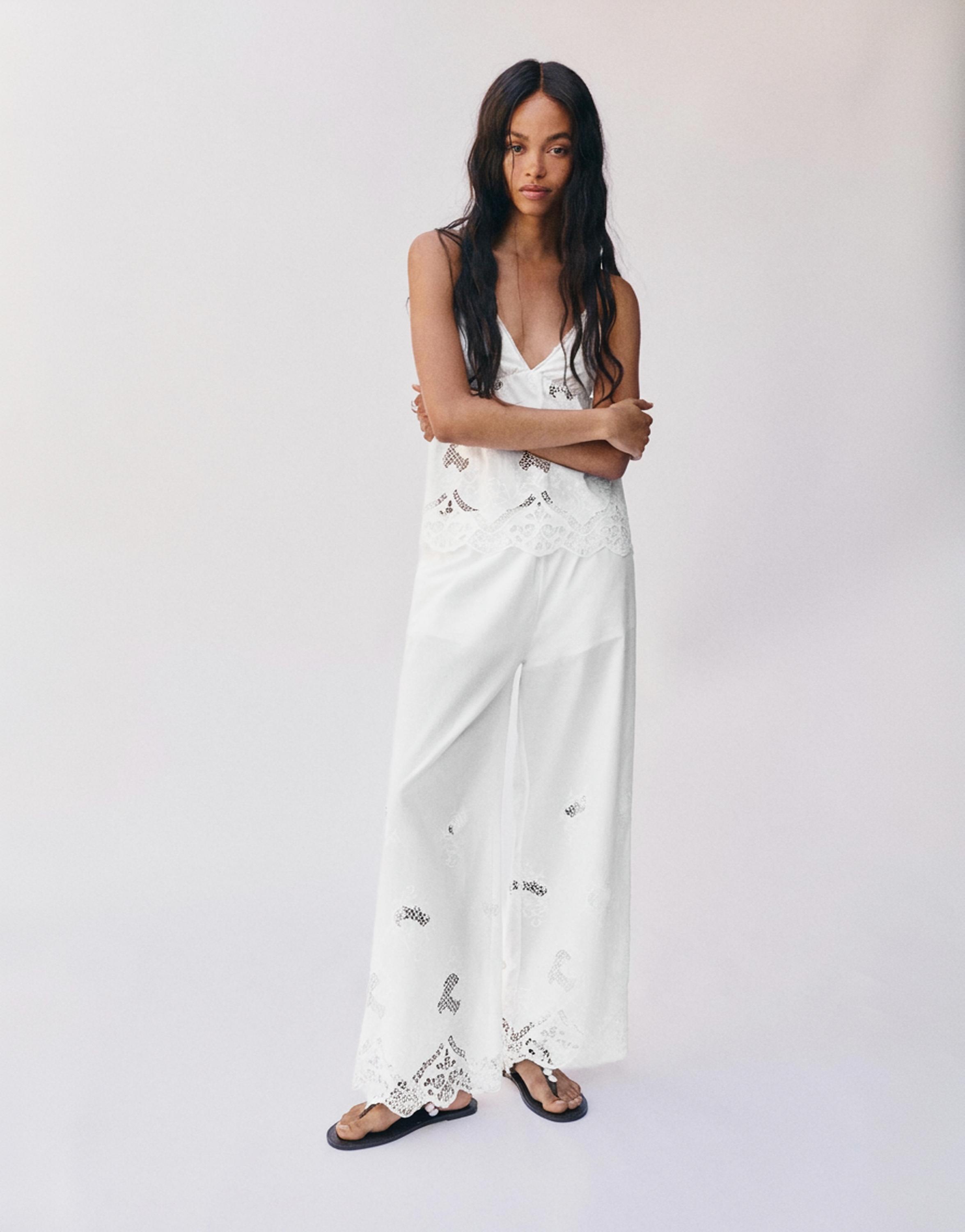White trousers with Swiss embroidery — White