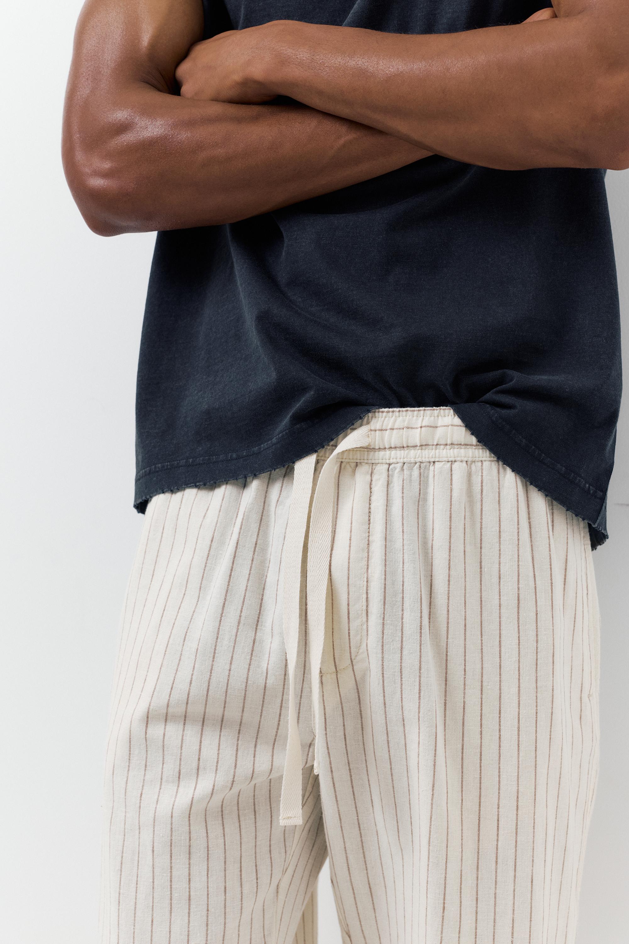 Linen blend jogger trousers — Striped