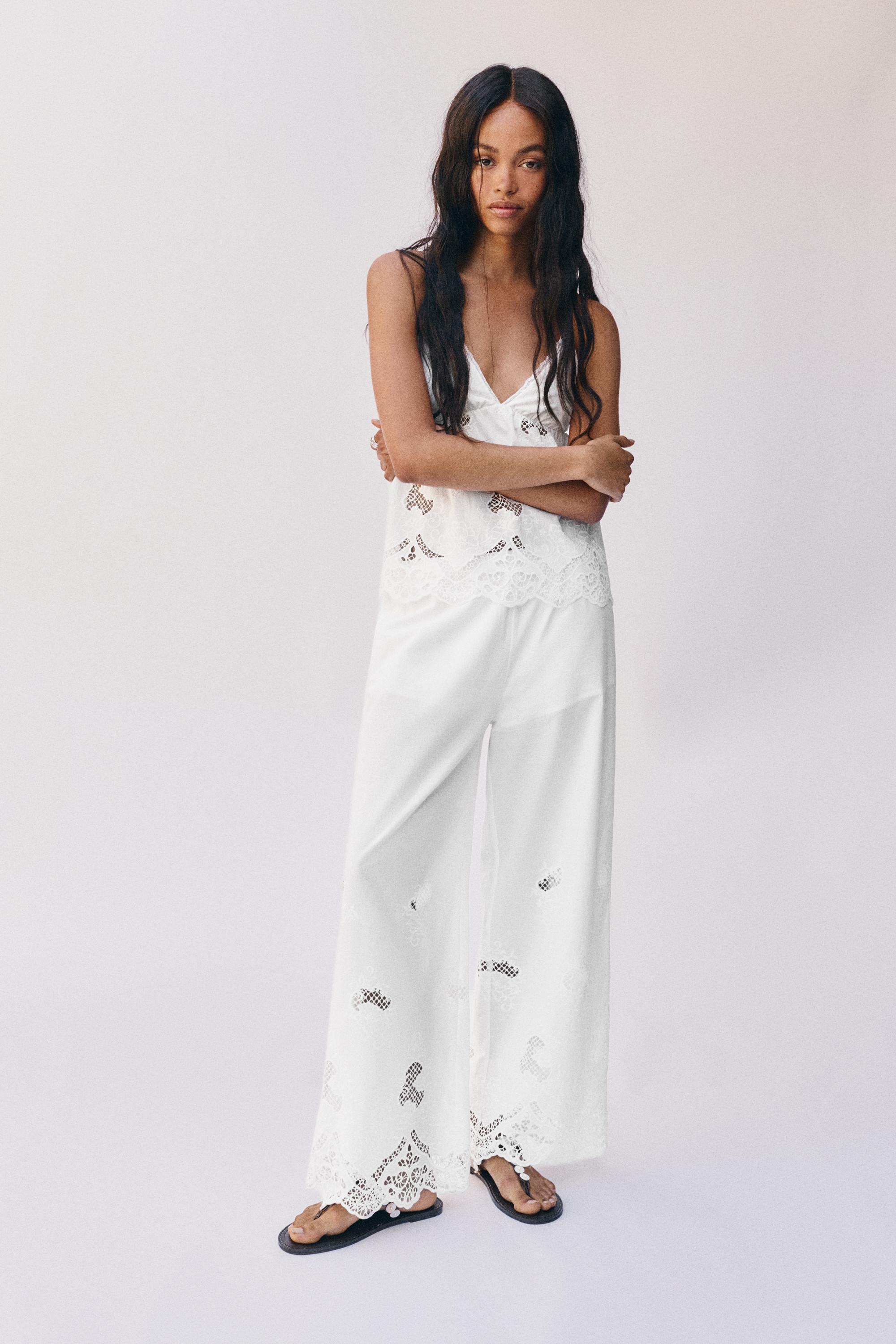 White trousers with Swiss embroidery — White