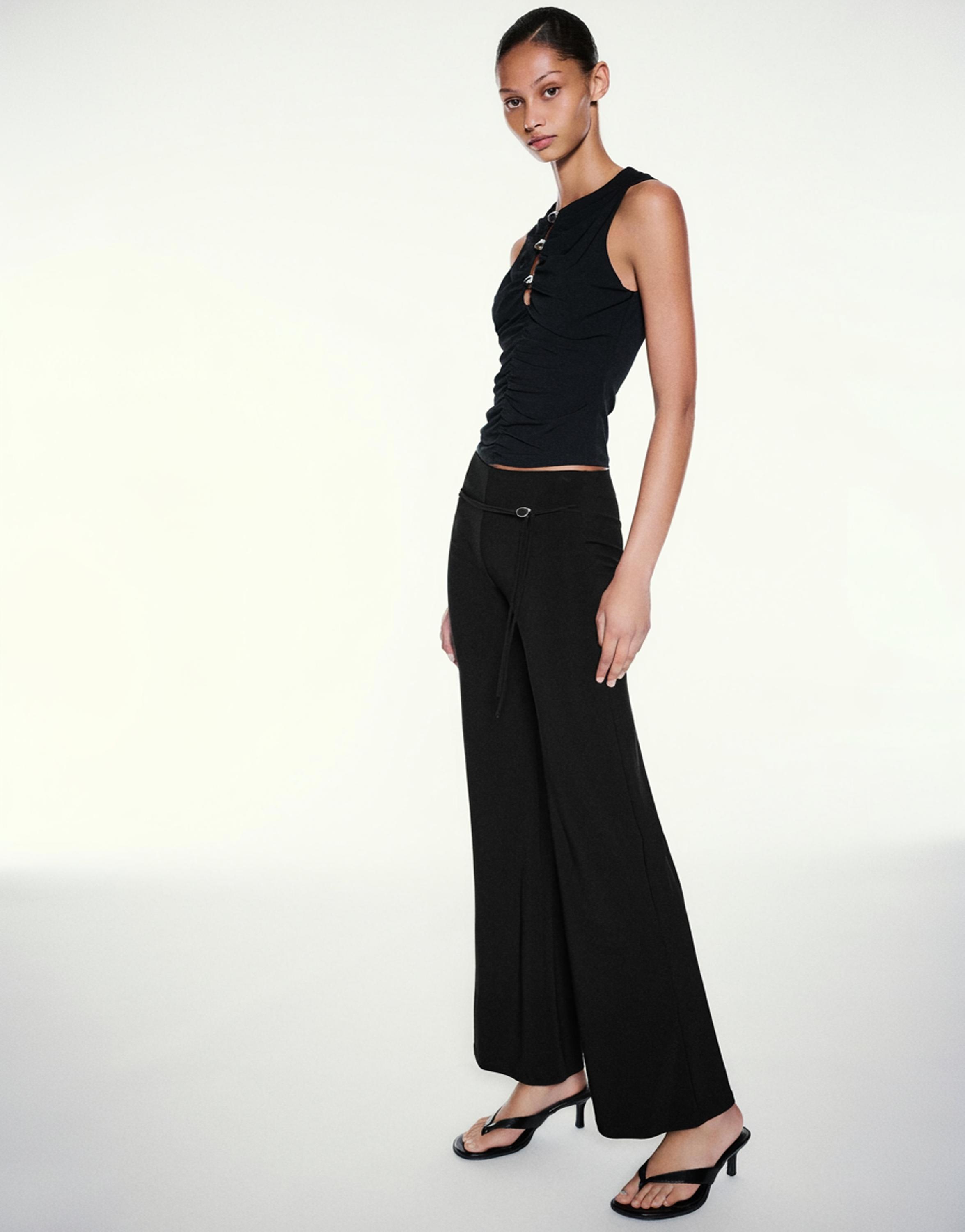 Black flared trousers — Black