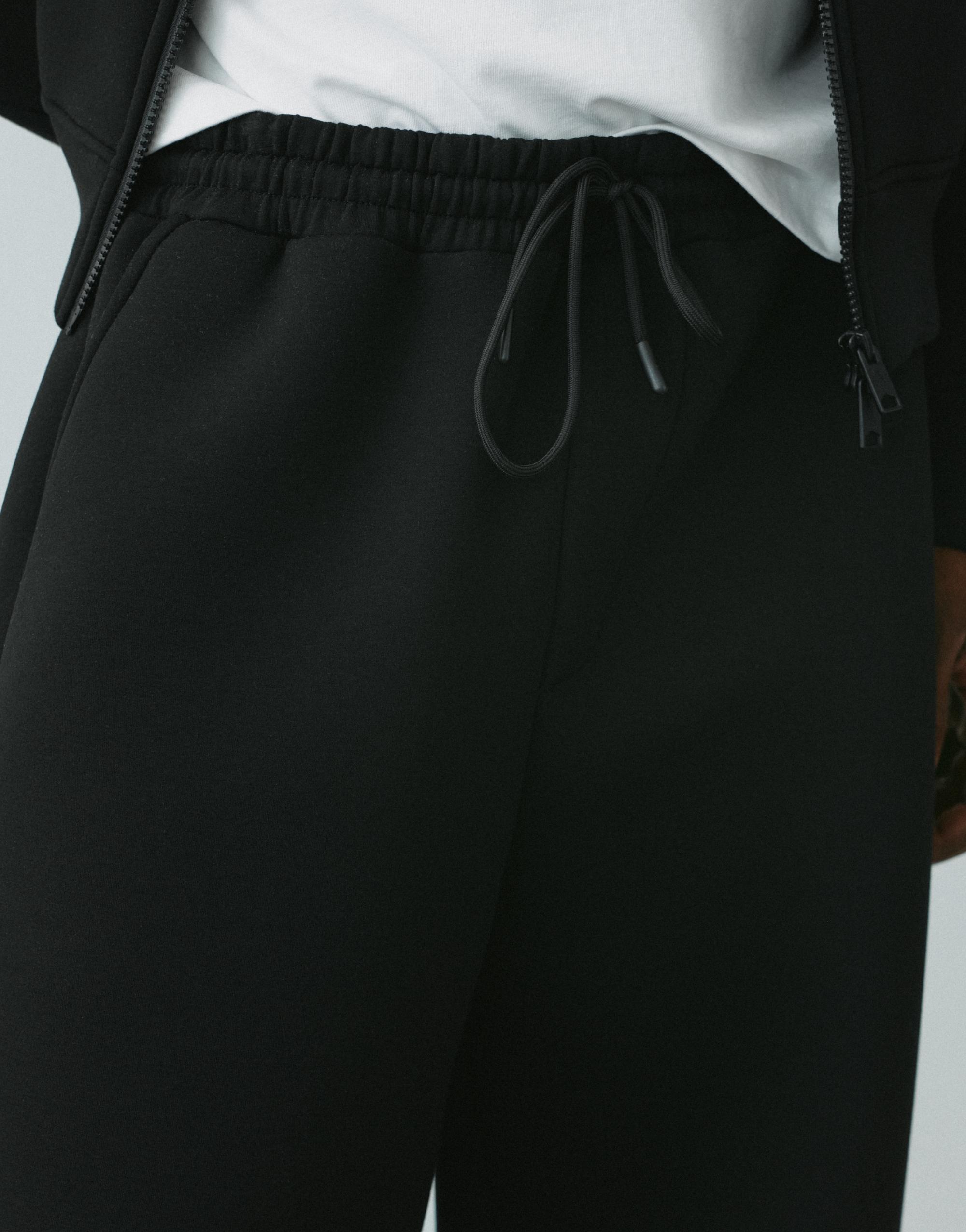 Neoprene-effect baggy trousers — Black