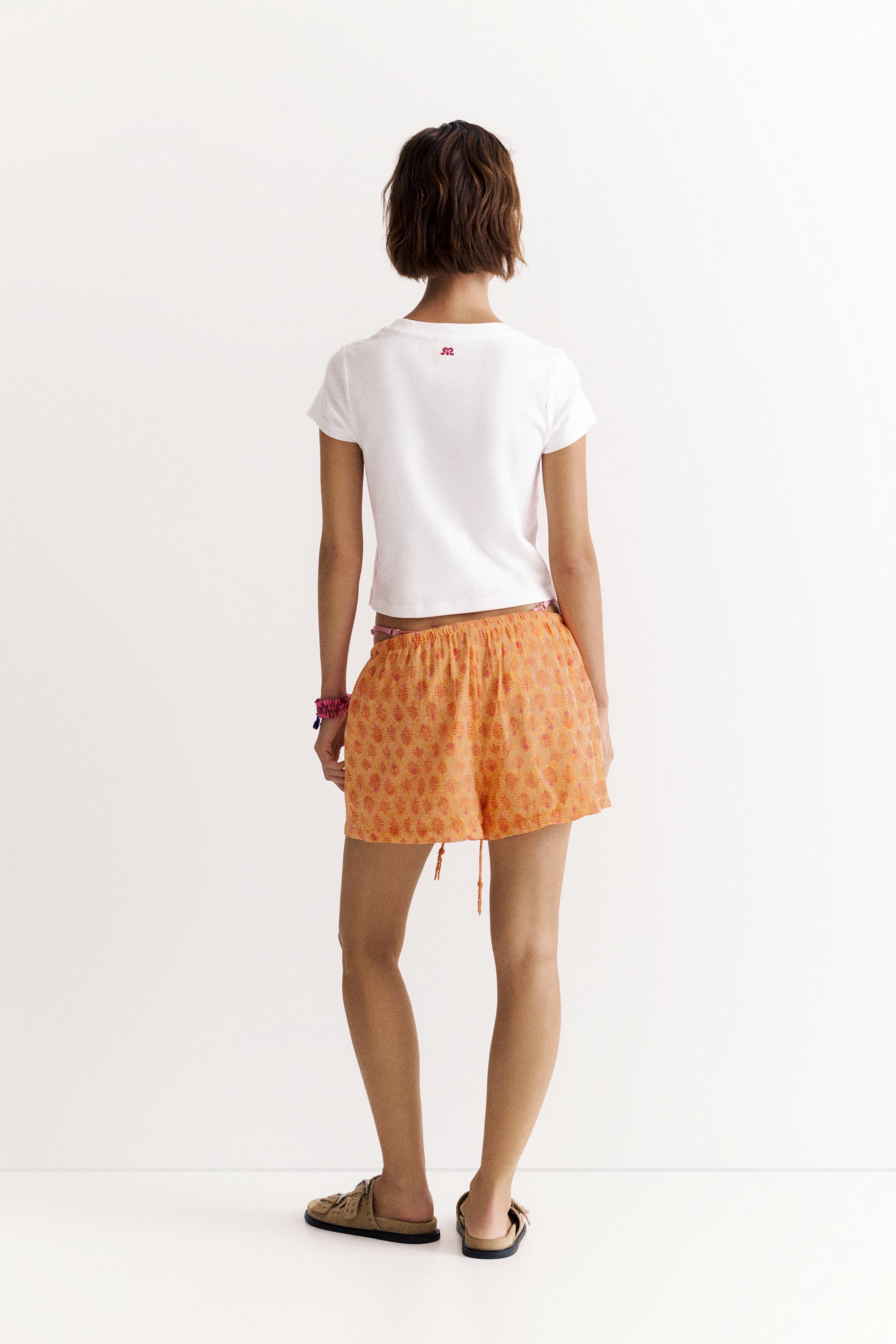 Hibiscus floral graphic T-shirt — Ice