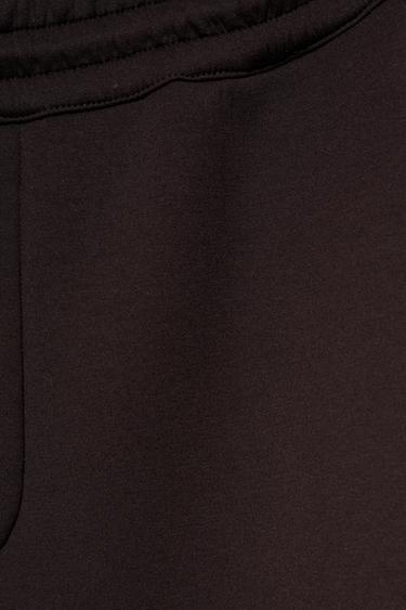 Neoprene-effect darted trousers — Brown 7