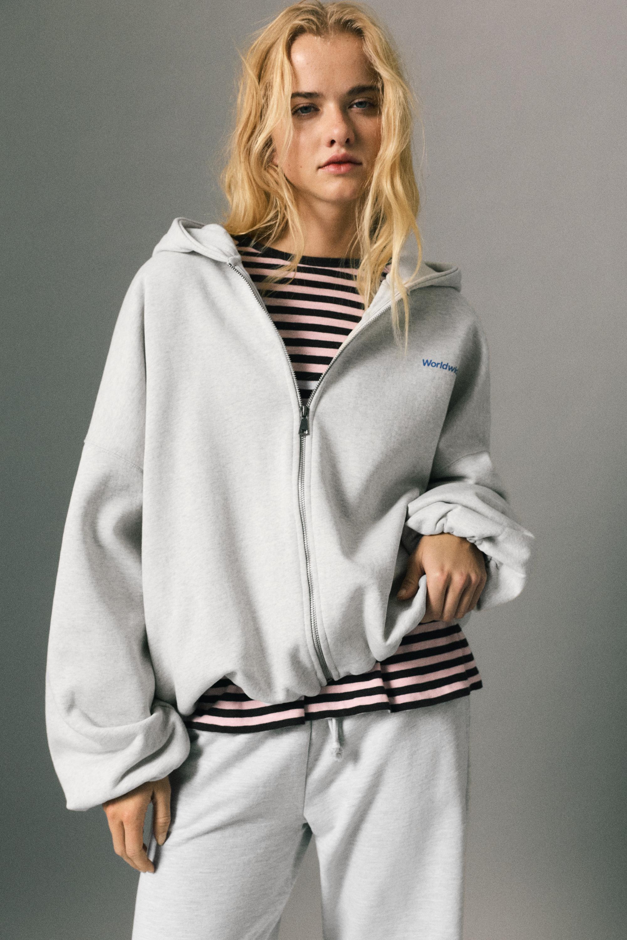 Sudadera capucha cremallera