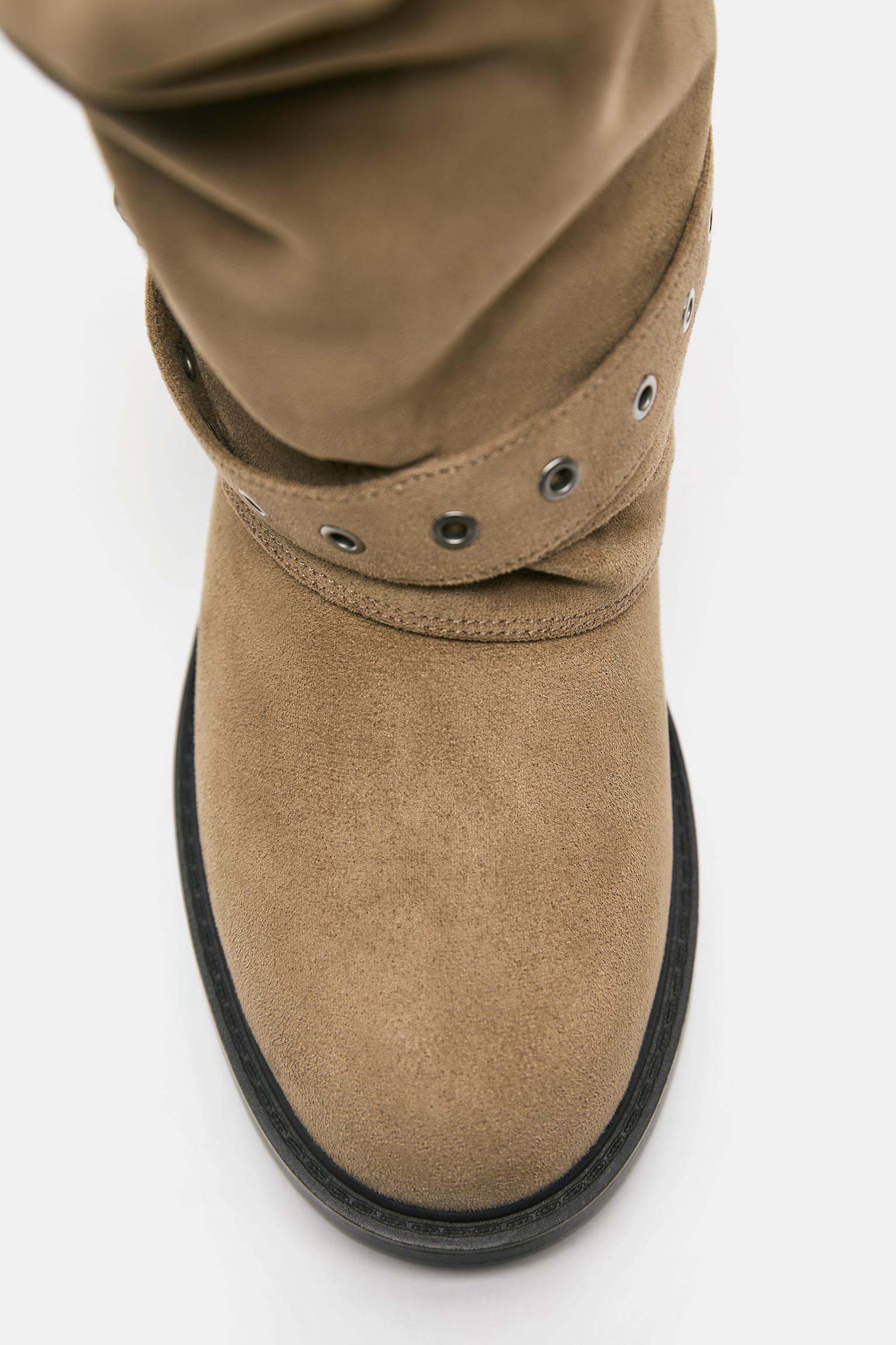 Buckled footed leggings boots