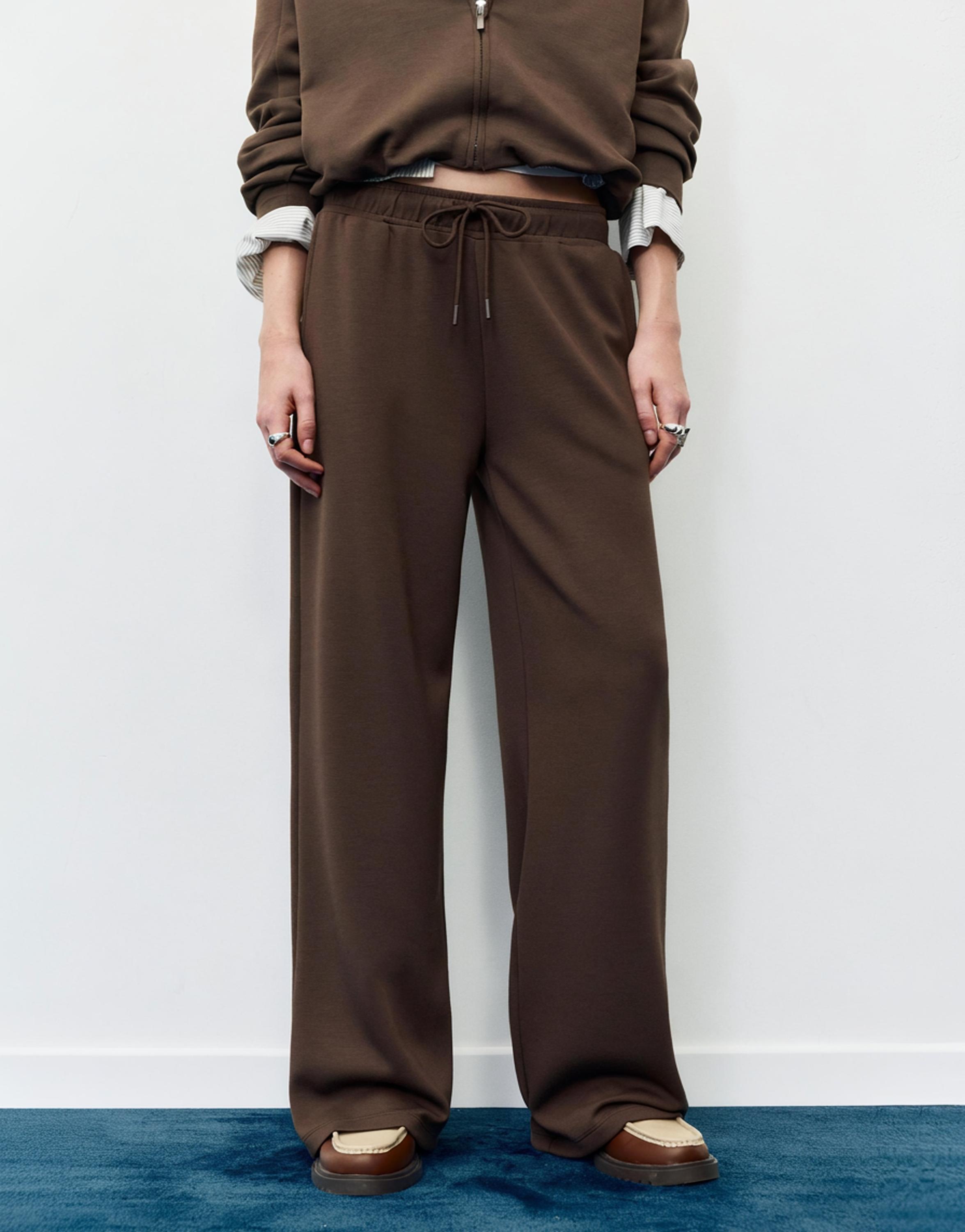 Soft-touch wide-leg trousers — Brown