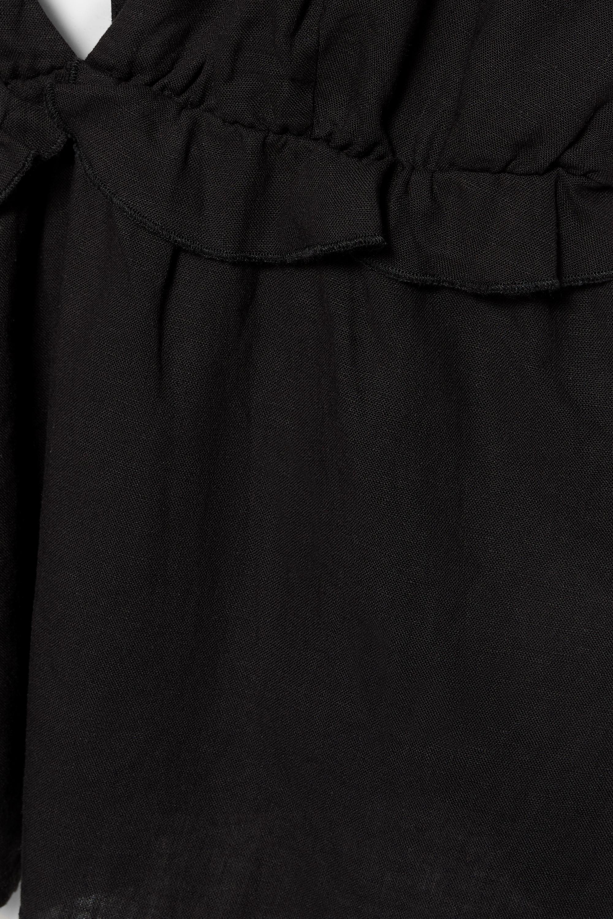 Ruffled linen top — Black