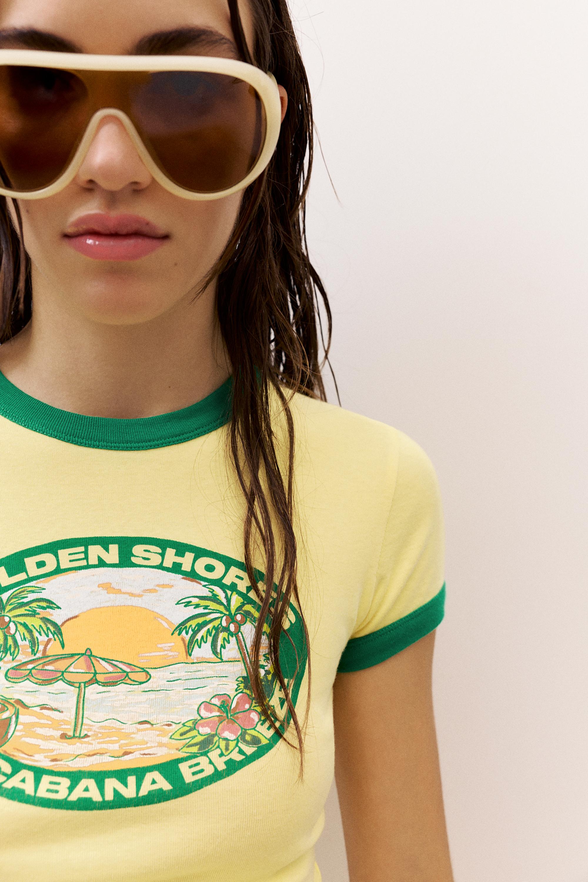 Yellow Copacabana graphic T-shirt — Yellow